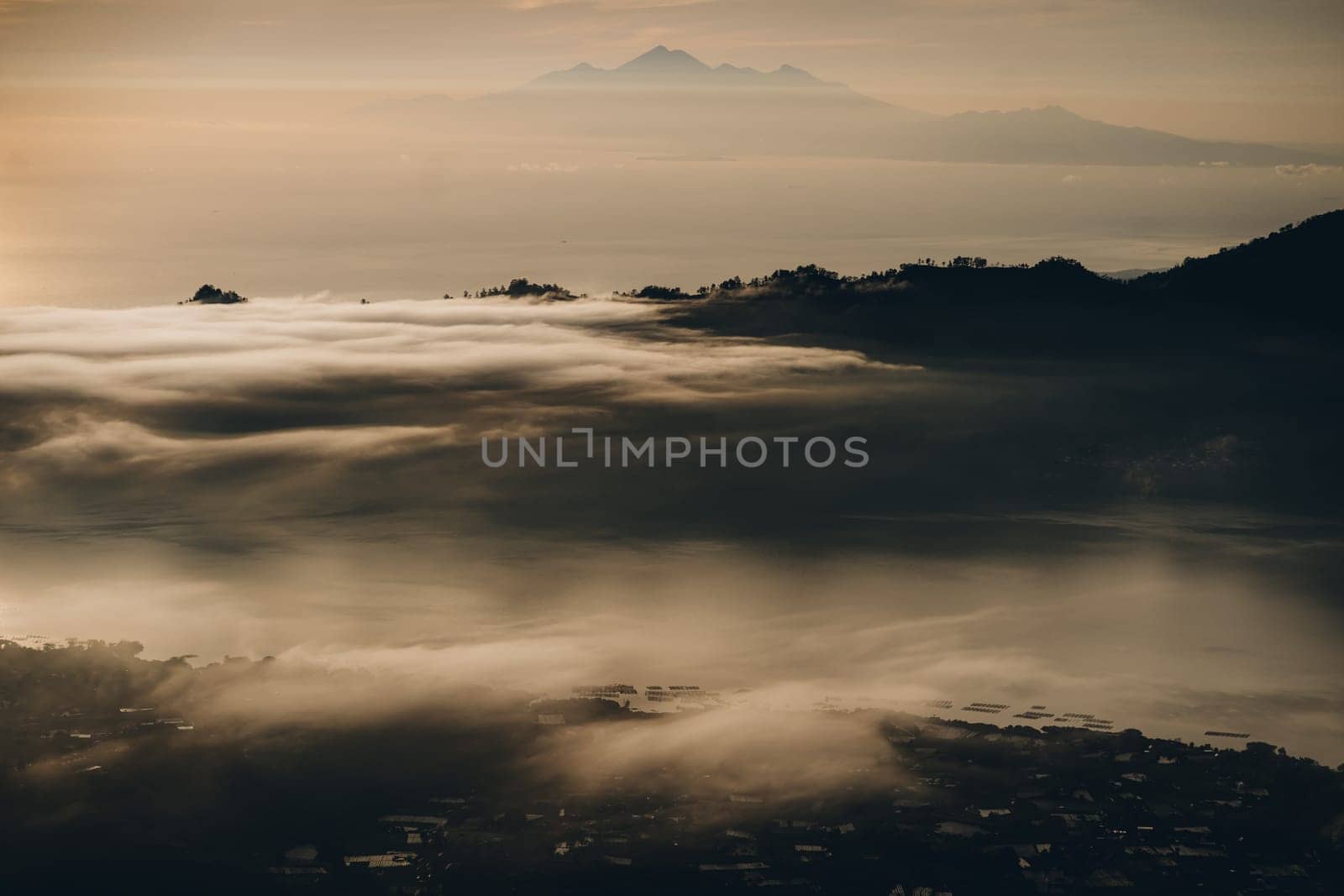 Early morning sunrise clouds at mountain Batur by Popov