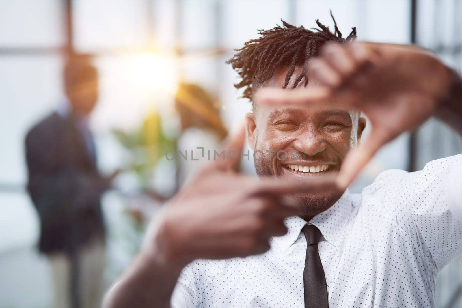 young african american man making a square with his hands