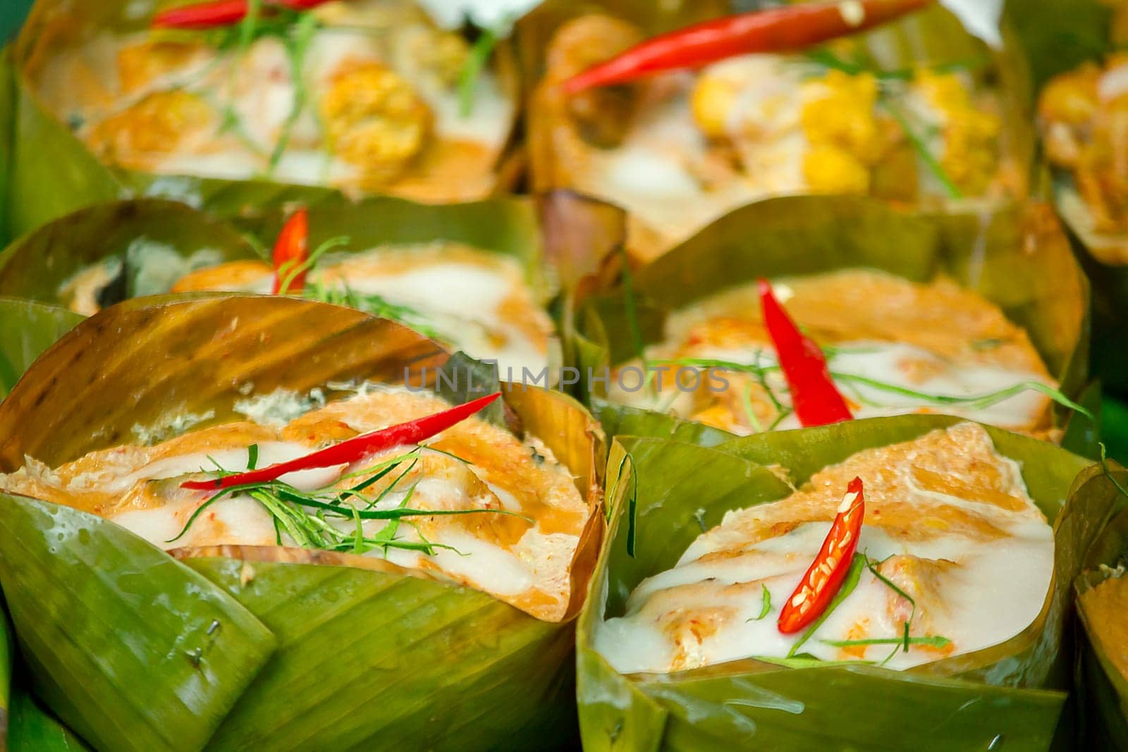 steamed fish with curry paste is another popular Thai dish
