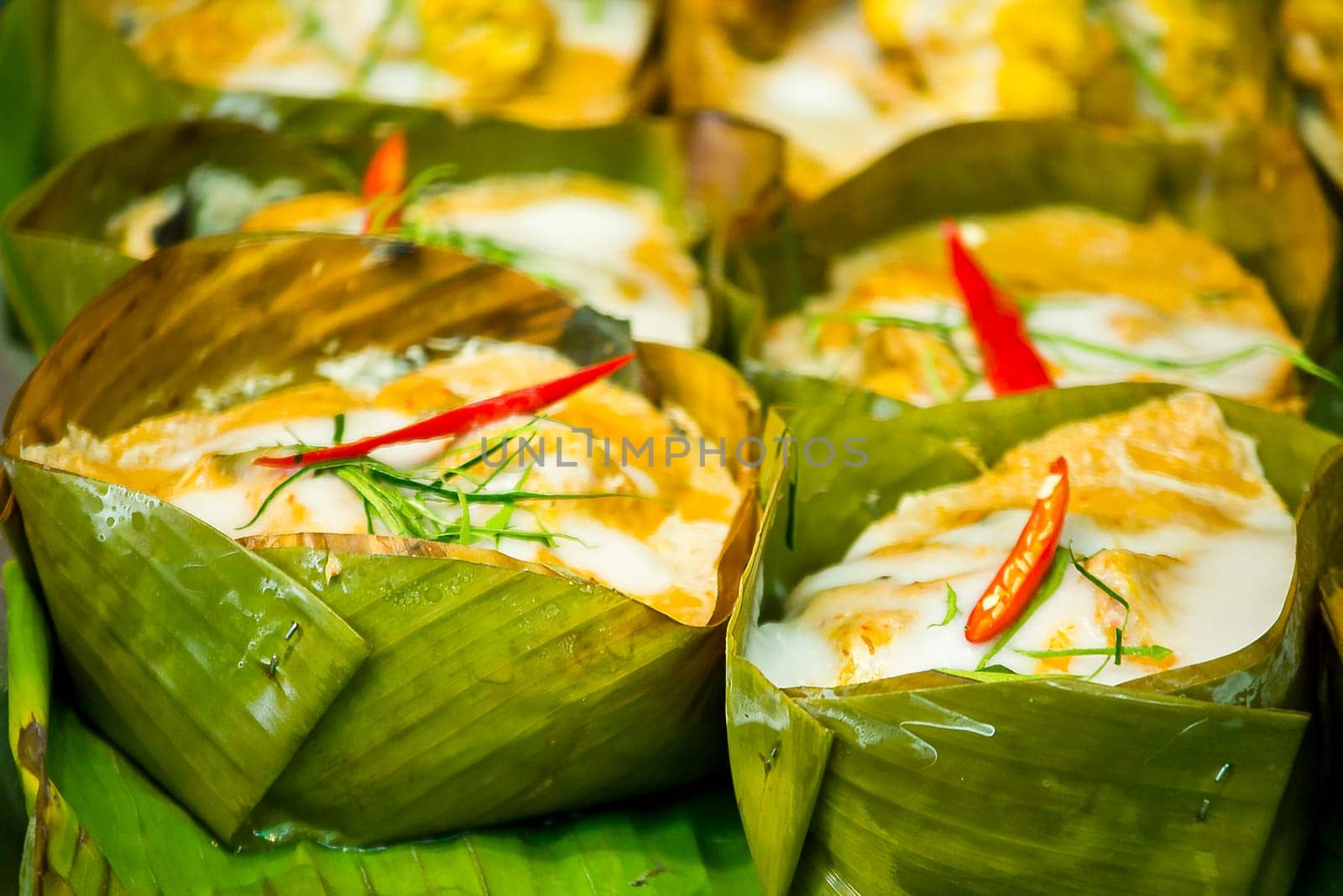 steamed fish with curry paste is another popular Thai dish