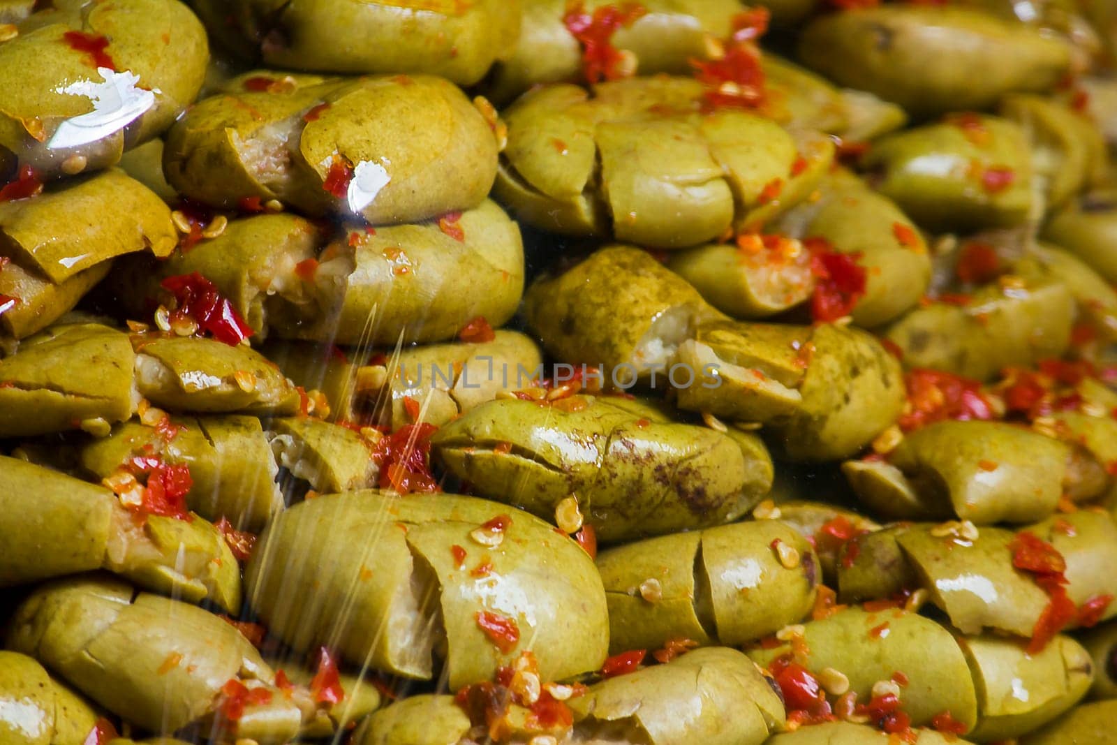 Crystallized olive, use olive water to pickle and then crystallize it to be delicious.