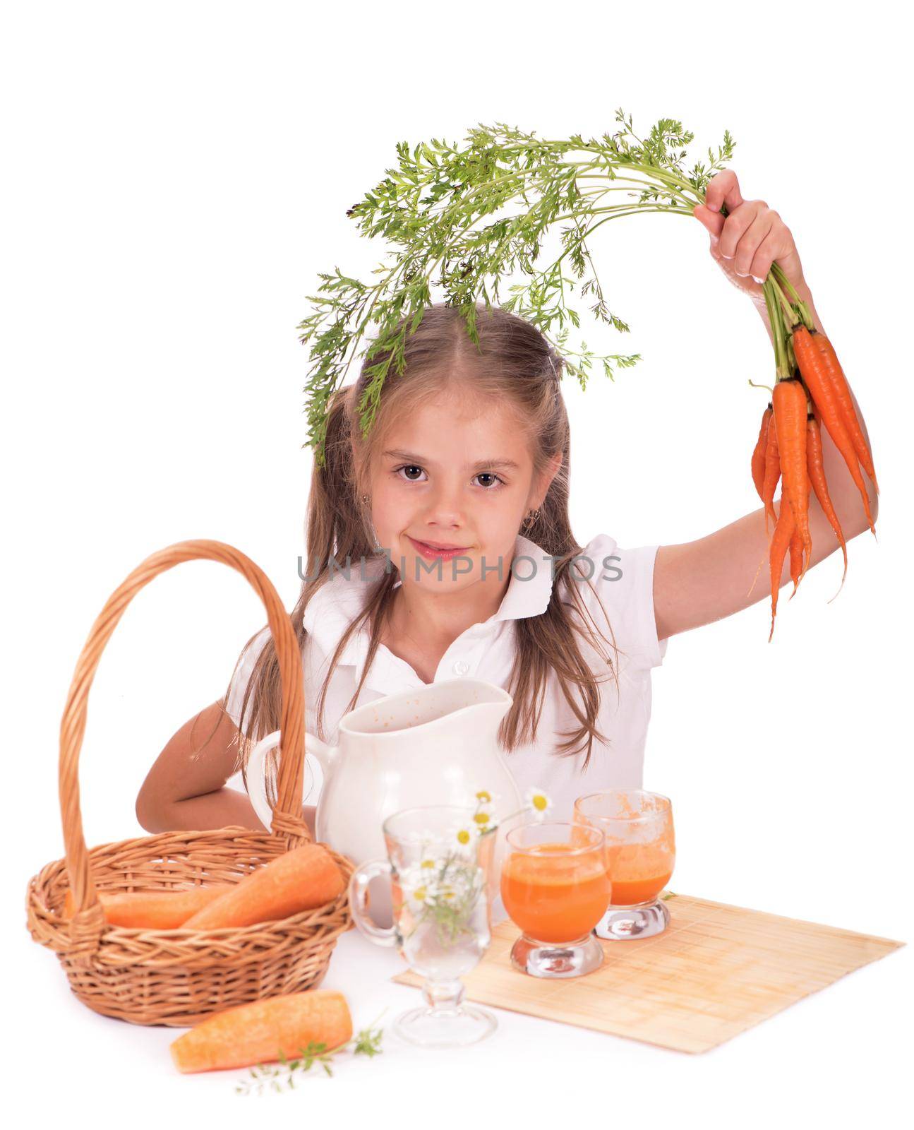 Girl and carrot juice isolated on white background by aprilphoto