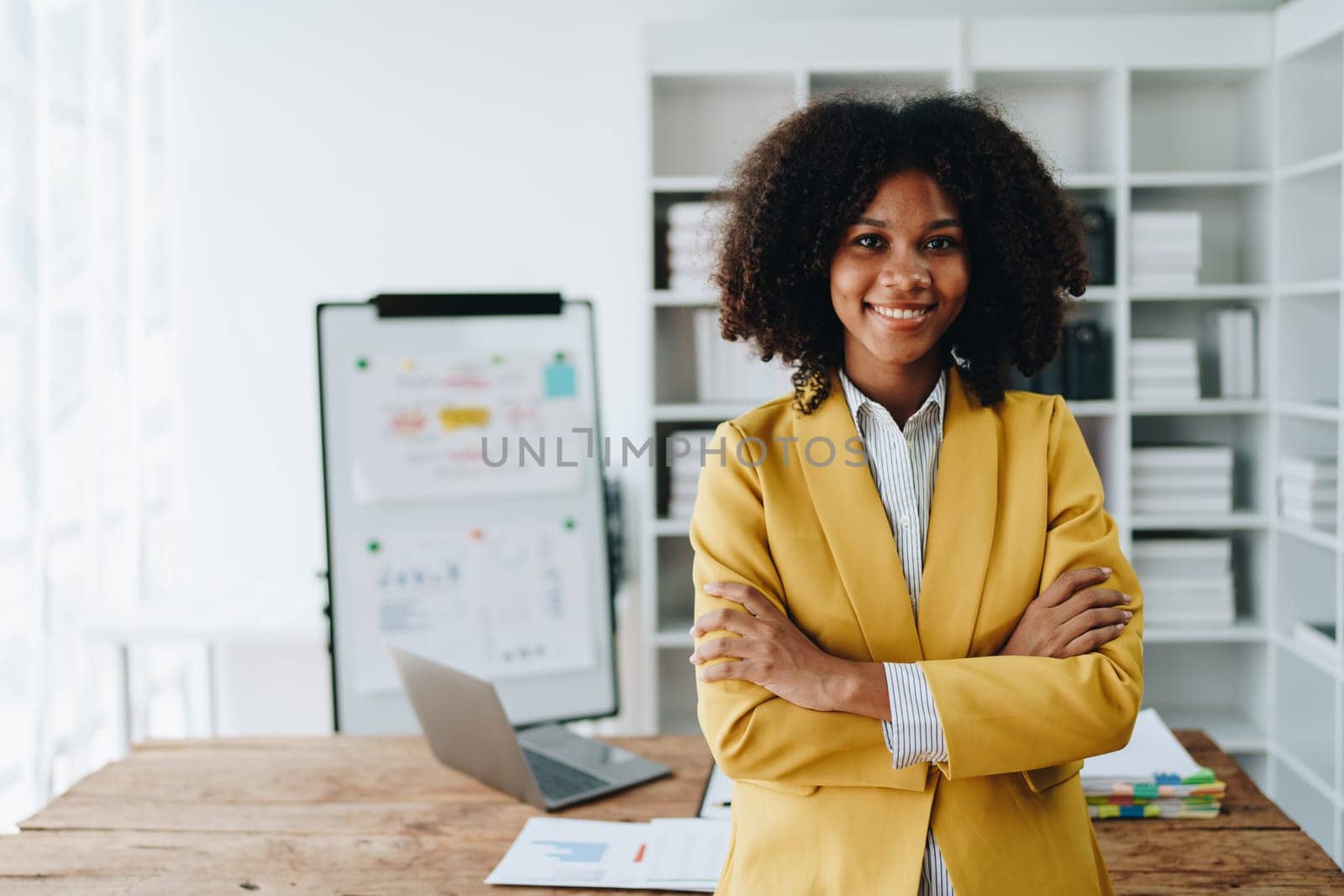 American African business woman using document, computer laptop, calculator, paperwork, documents, in winner and smiling Happy to be successful achievement success. finance and investment concepts.