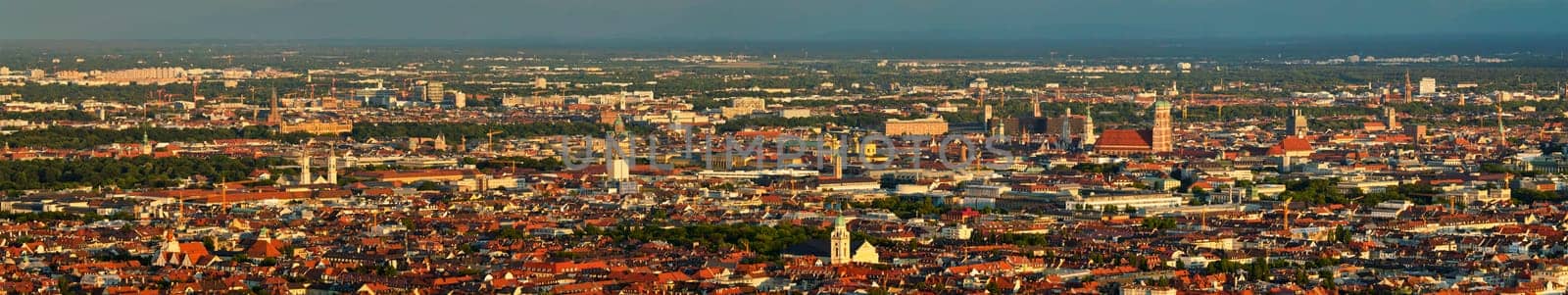 Aerial panorama of Munich center from Olympiaturm (Olympic Tower) on sunset. Munich, Bavaria, Germany