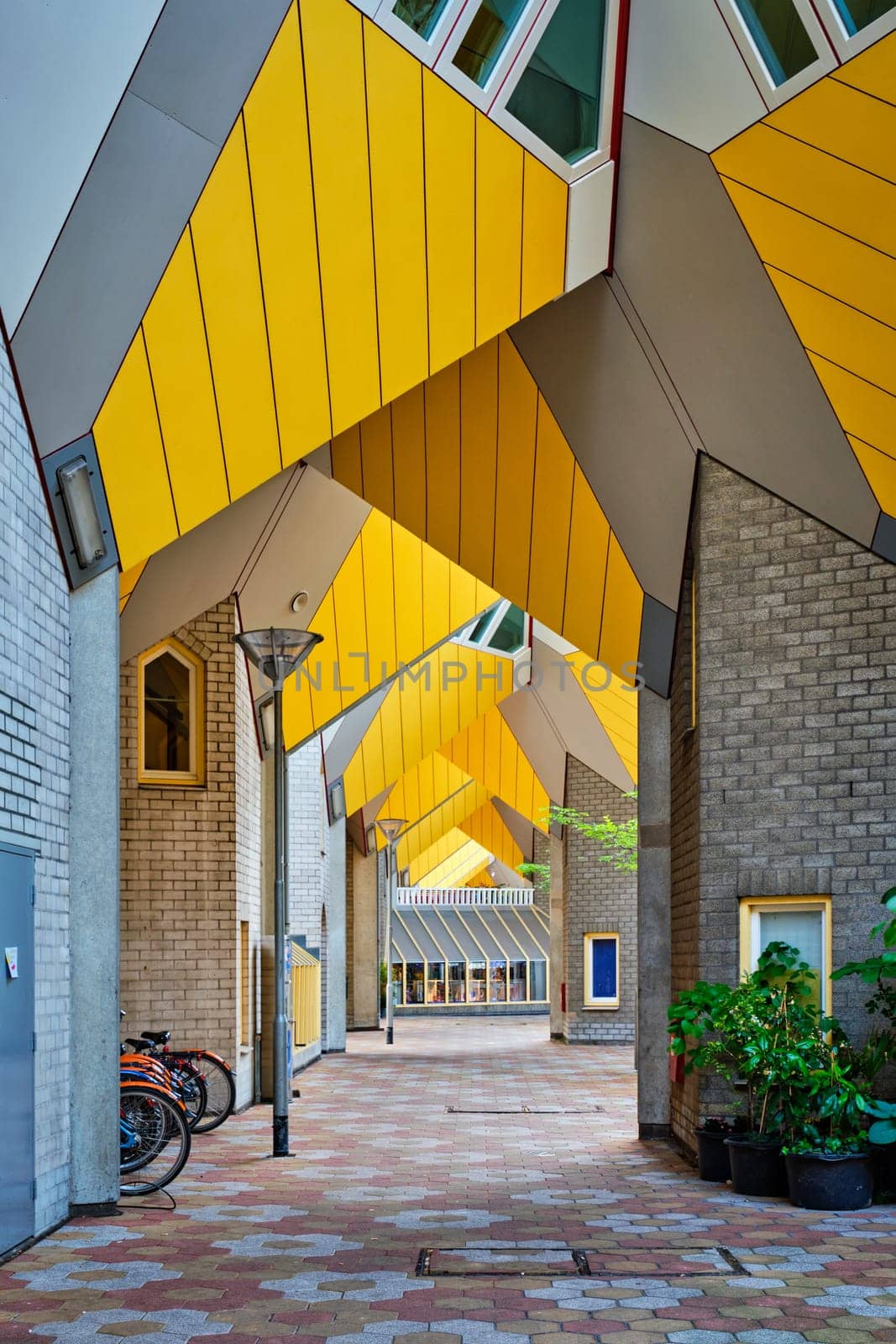 ROTTERDAM, NETHERLANDS - MAY 11, 2017: Cube houses - innovative cube-shaped houses designed by architect Piet Blom with idea to optimize space in Rotterdam, Netherlands now became a tourist attraction