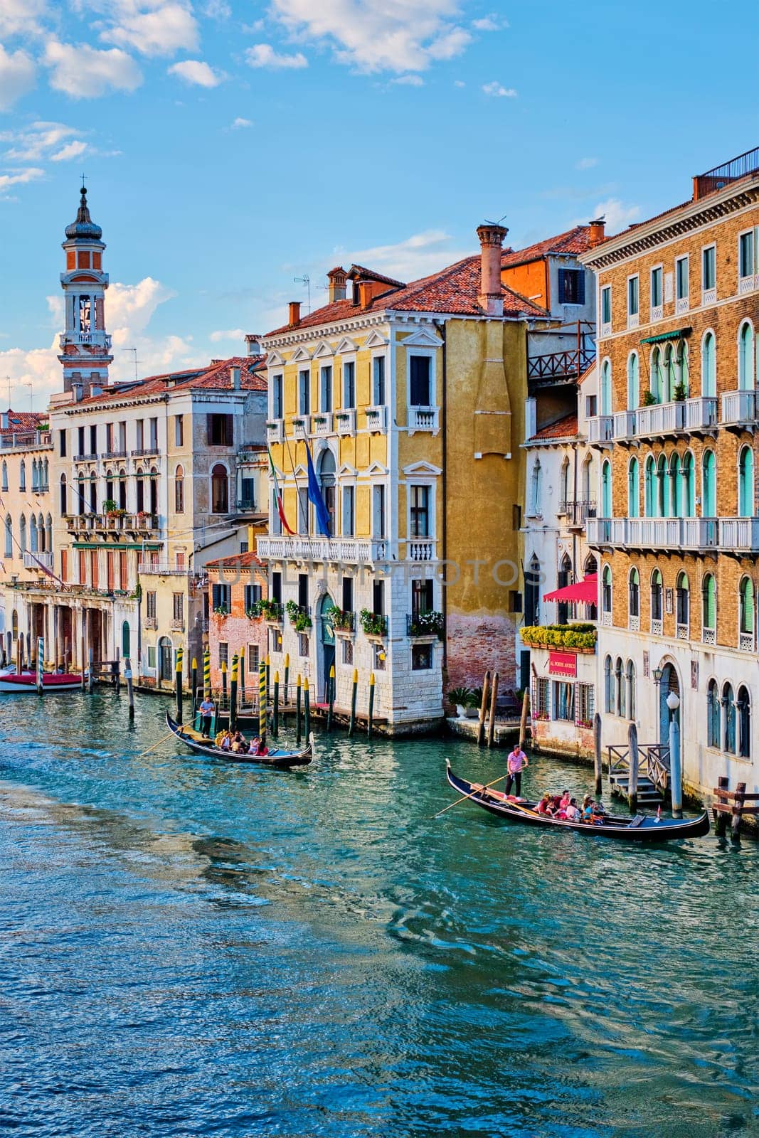 Grand Canal with boats and gondolas on sunset, Venice, Italy by dimol