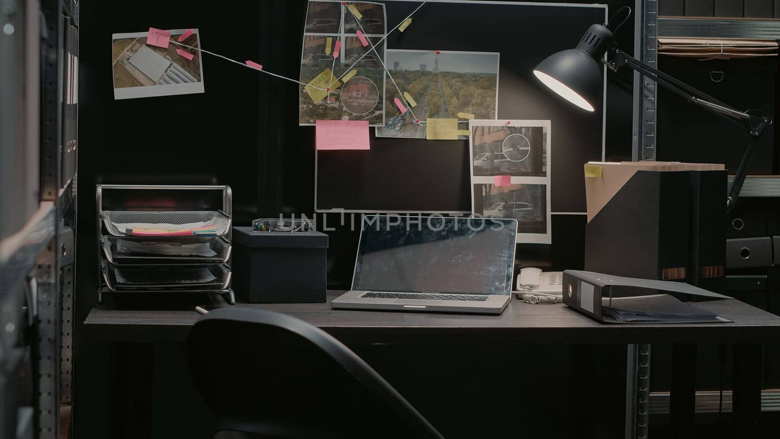 Empty police archive with case files for investigation, board filled with important clues. Suspicious research photos and forensic evidence on walls, gathered information in detective office.