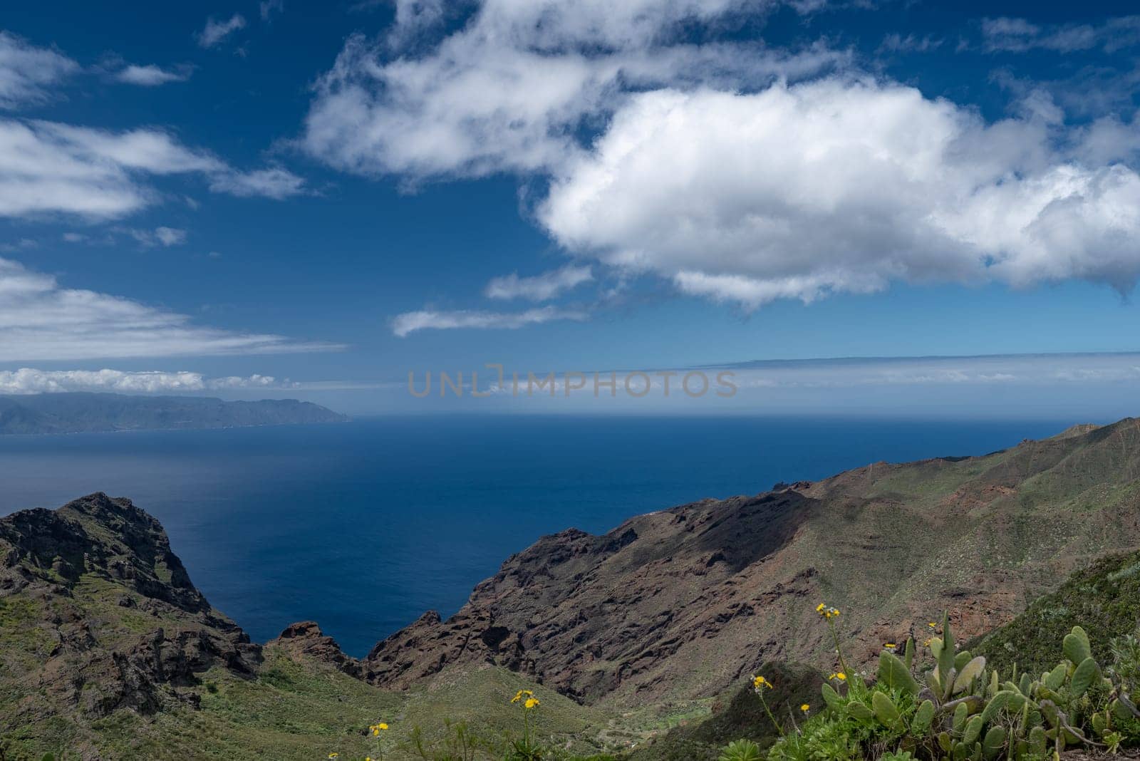 Summer landscape of green mountains and blue sky by amovitania