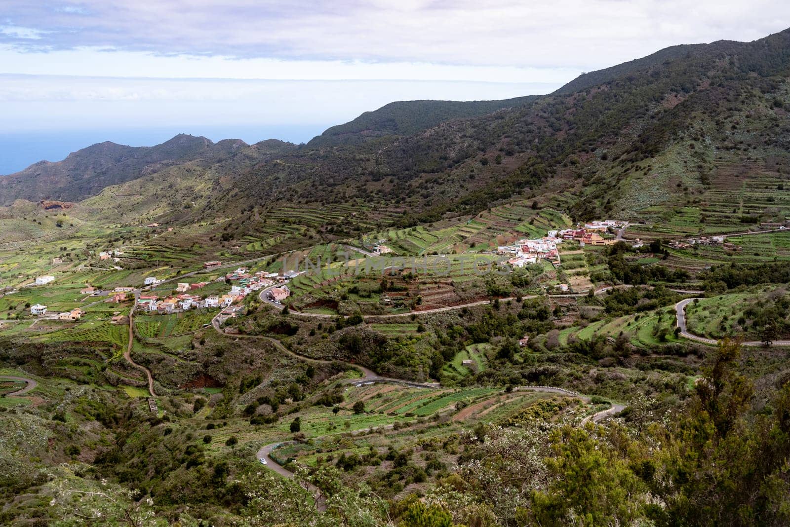 Summer landscape of green mountains and blue sky by amovitania