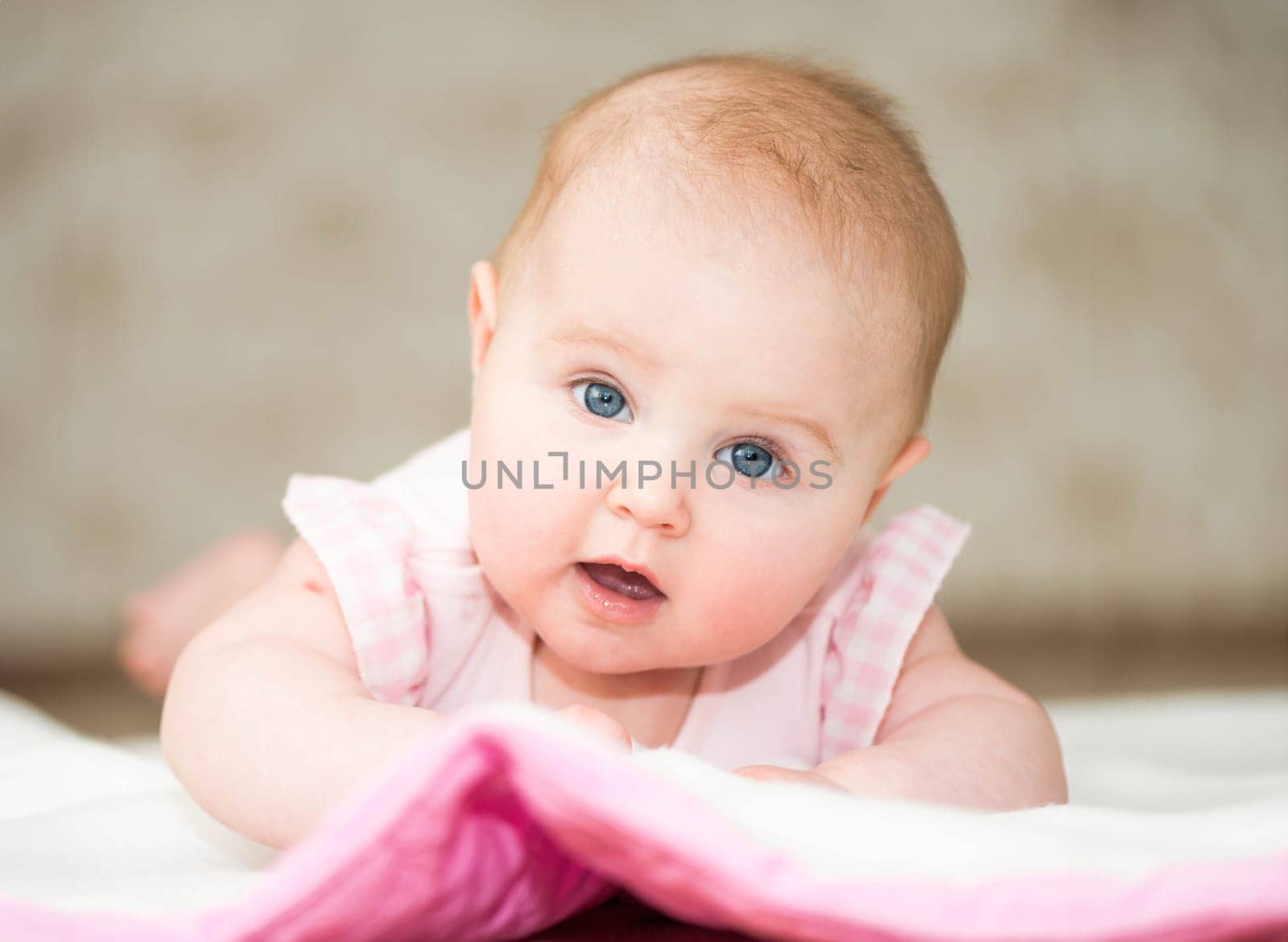 Portrait of cute 4-month-old baby close-up