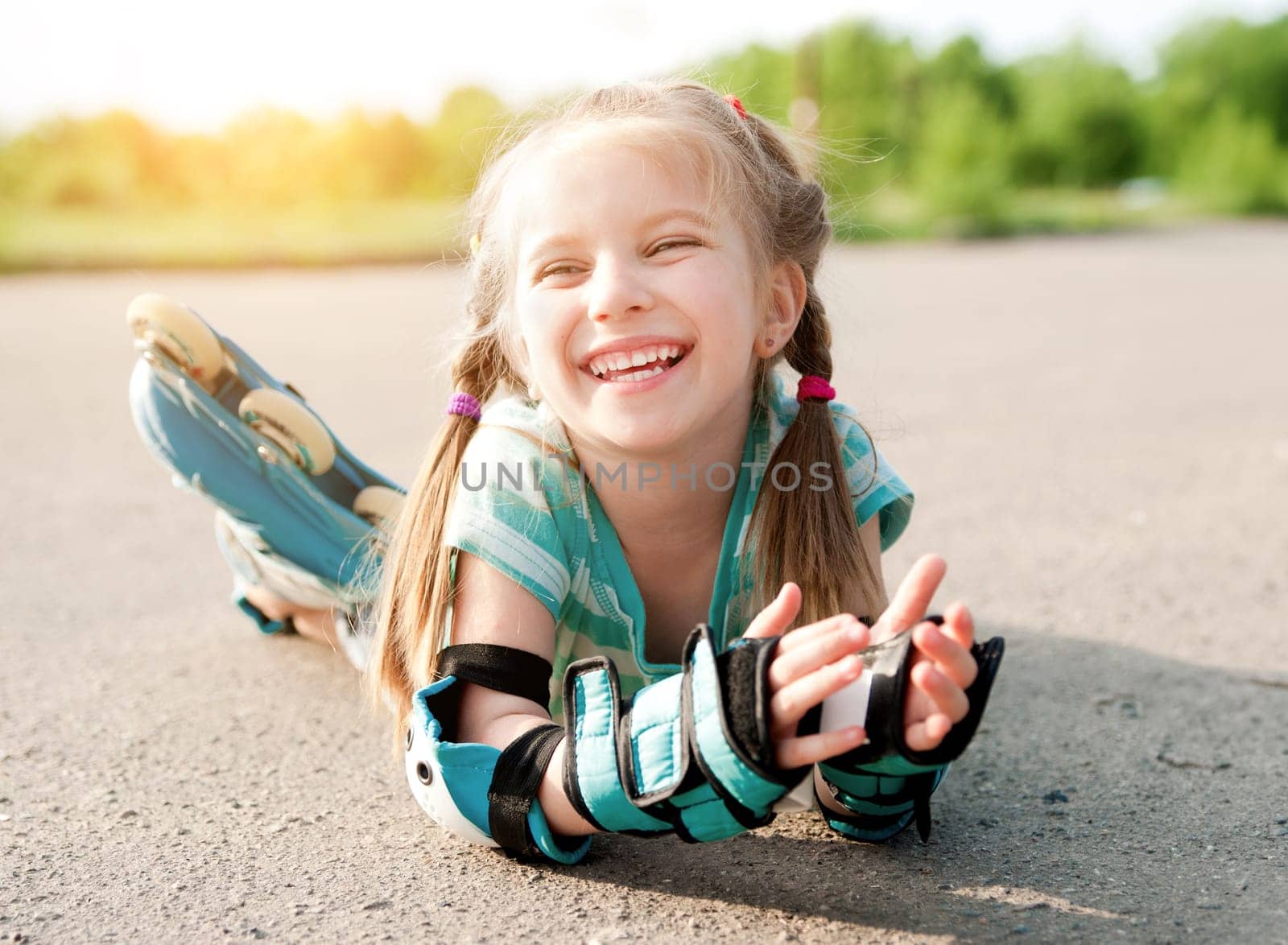 Little girl in roller skates at a park