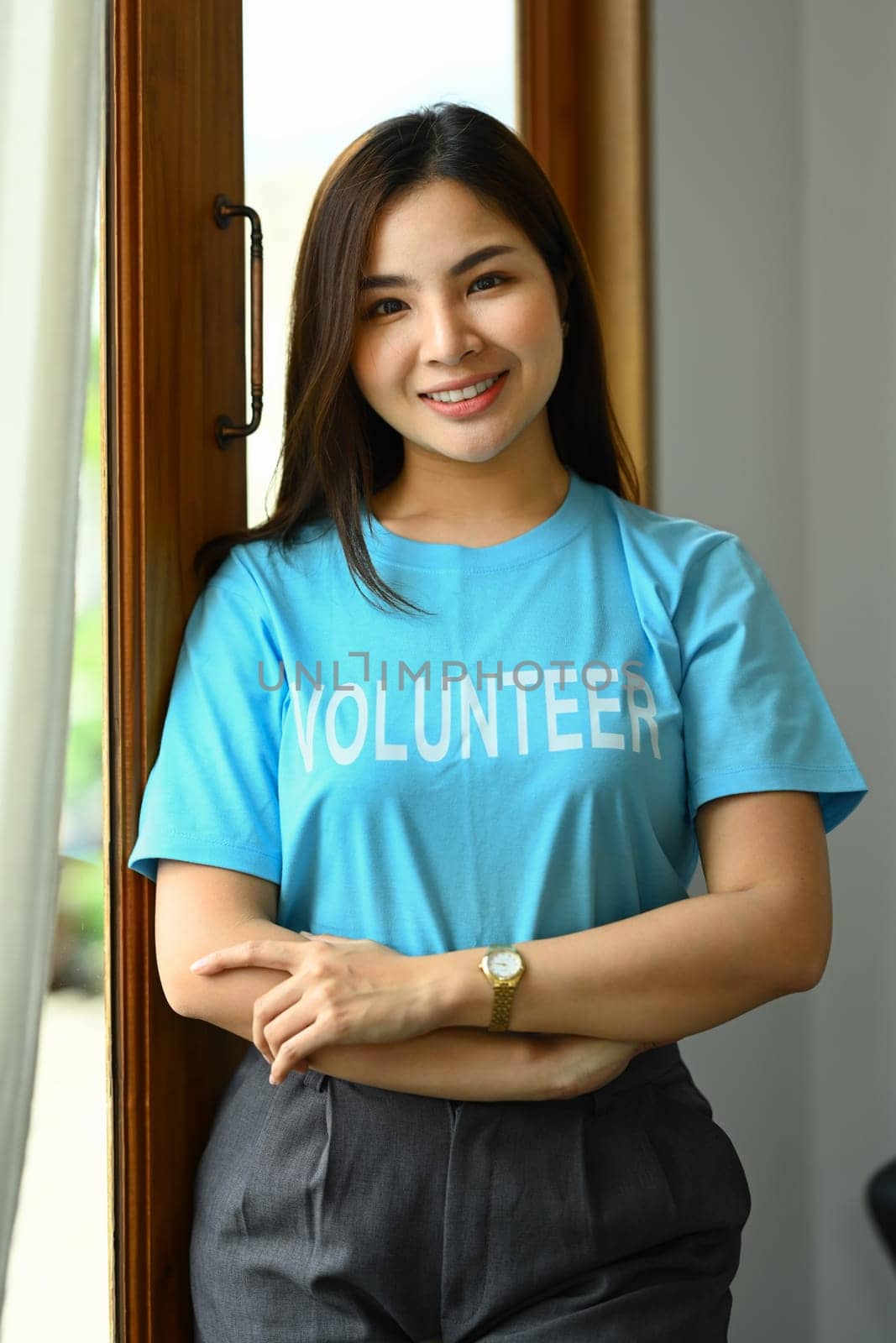 Portrait asian Woman volunteer smile and happy with looking camera..