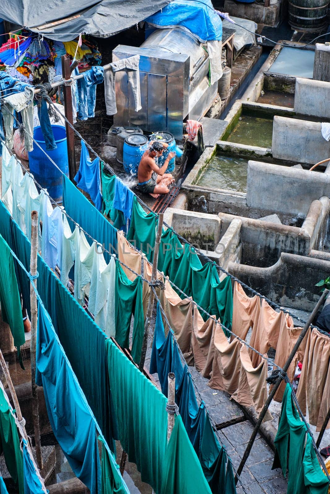 Dhobi Ghat Mahalaxmi Dhobi Ghat is an open air laundromat lavoir in Mumbai, India with laundry drying on ropes by dimol