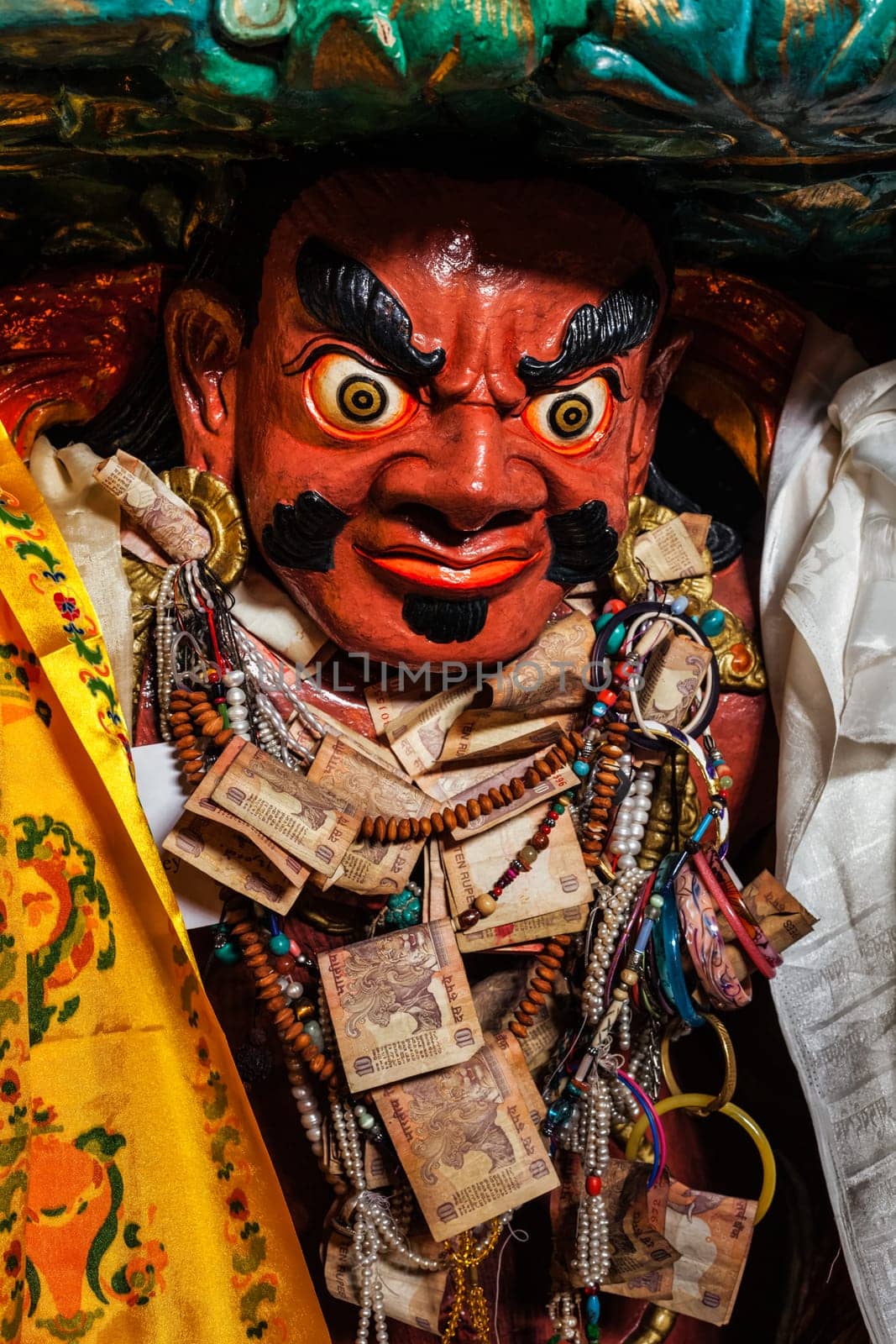 Statue of wrathful protective Buddhist deity in Hemis gompa. Ladakh, India by dimol