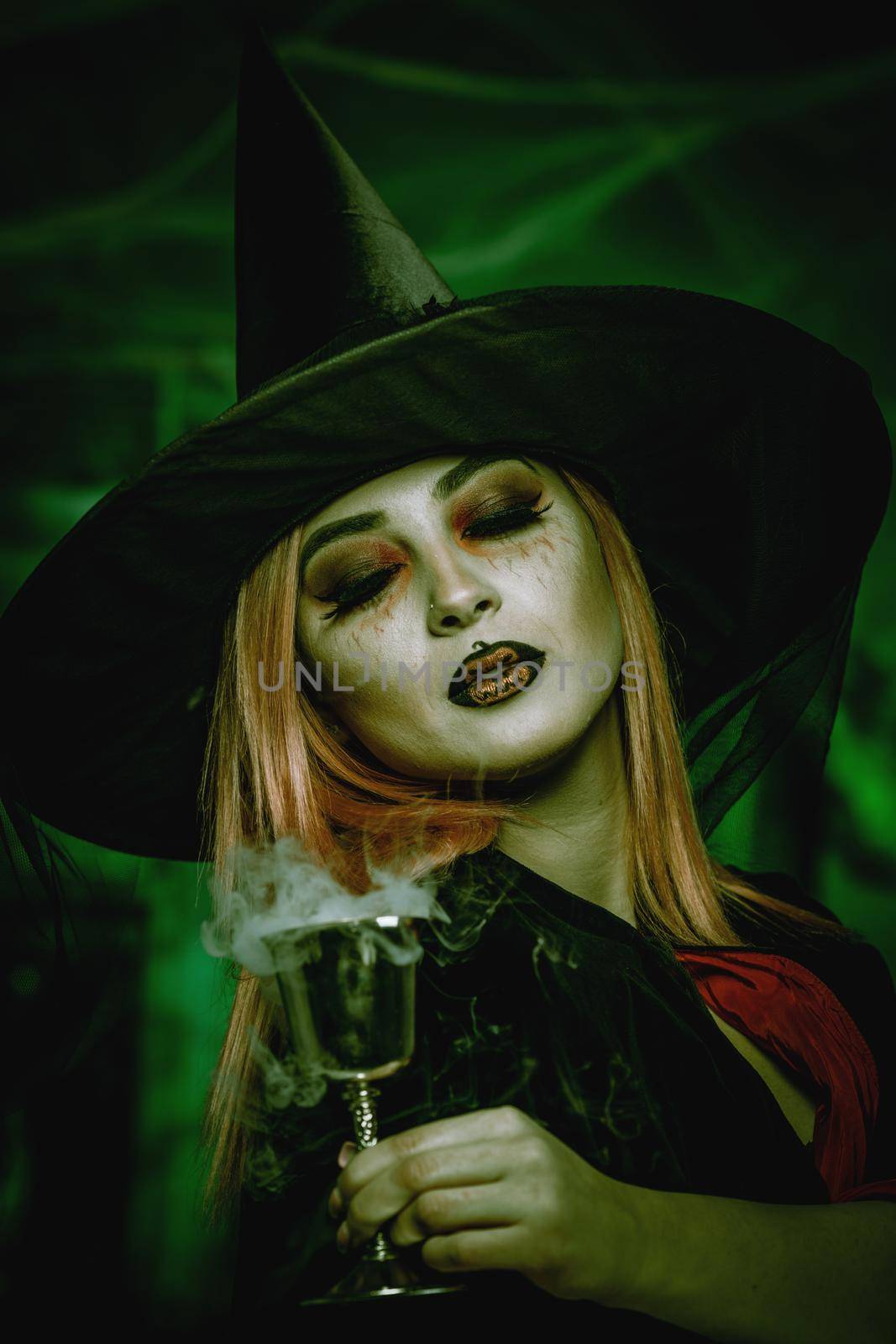 Witch Drinks Magic Potion by MilanMarkovic78