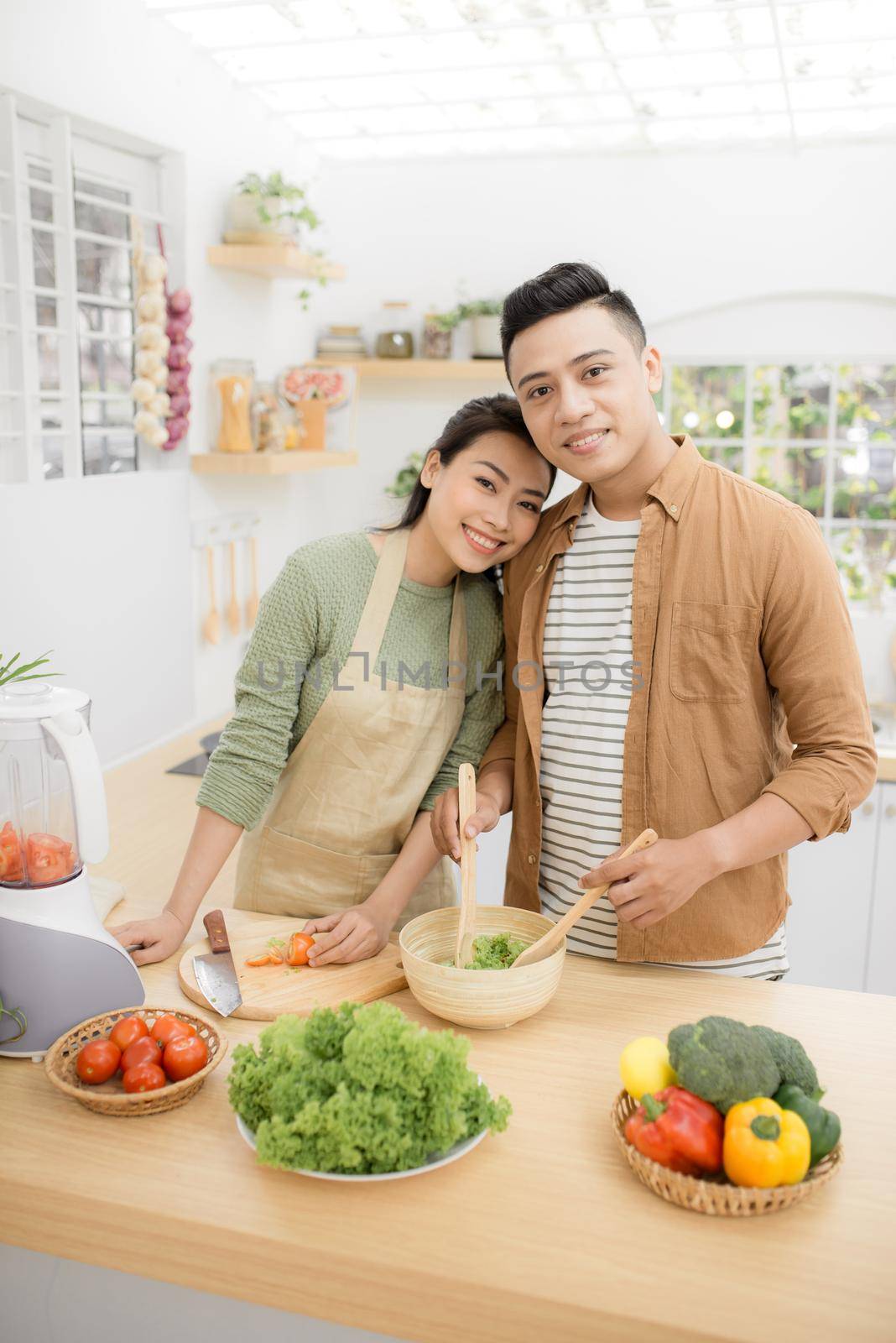  Young asian man and woman have romantic time while staying at home.