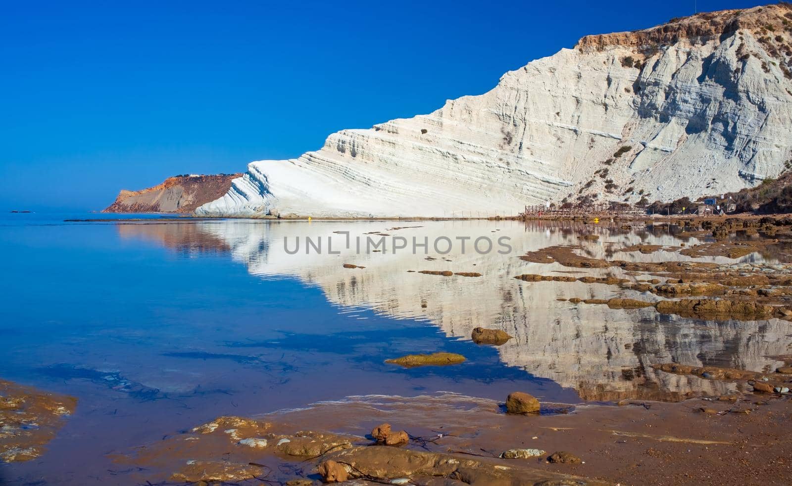 Scala dei Turchi. A fascinating limestone rock steep on an amazing sea in Realmonte, Agrigento by bepsimage