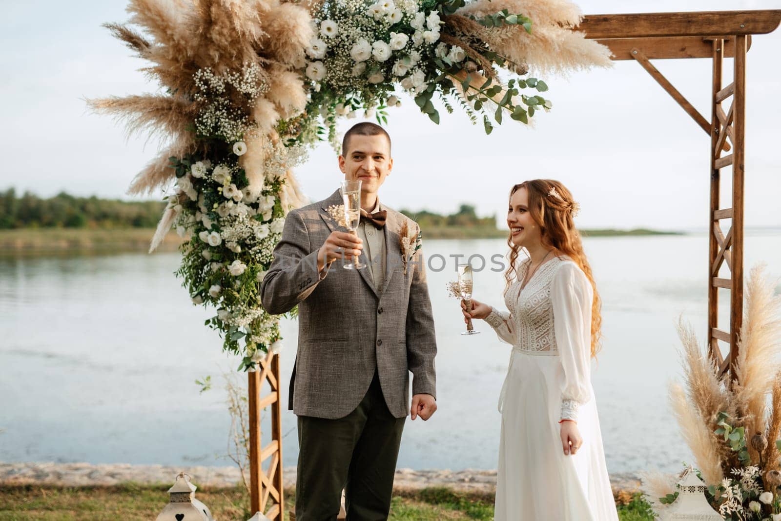 wedding ceremony of the newlyweds in a country cottage by Andreua