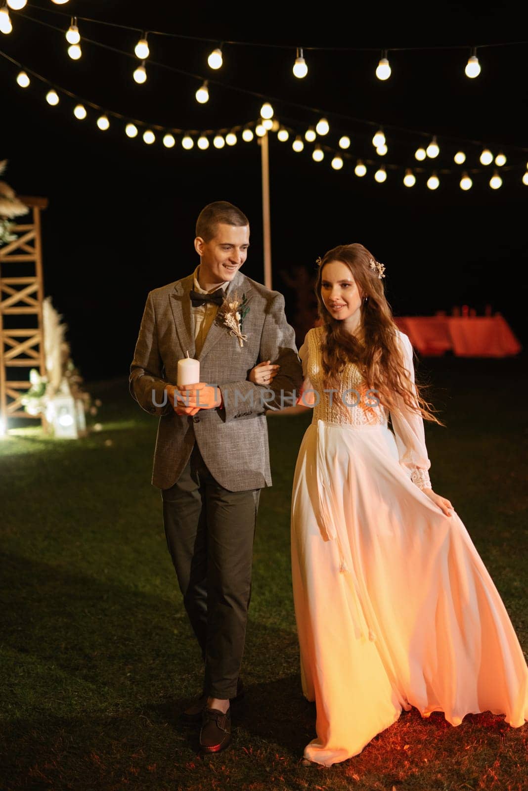 transfer of wedding fire with the help of candles from mothers to the newlyweds