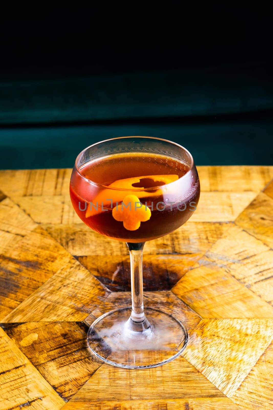 Fresh cocktail with orange and ice. Alcoholic, non-alcoholic drink-beverage at bar counter.