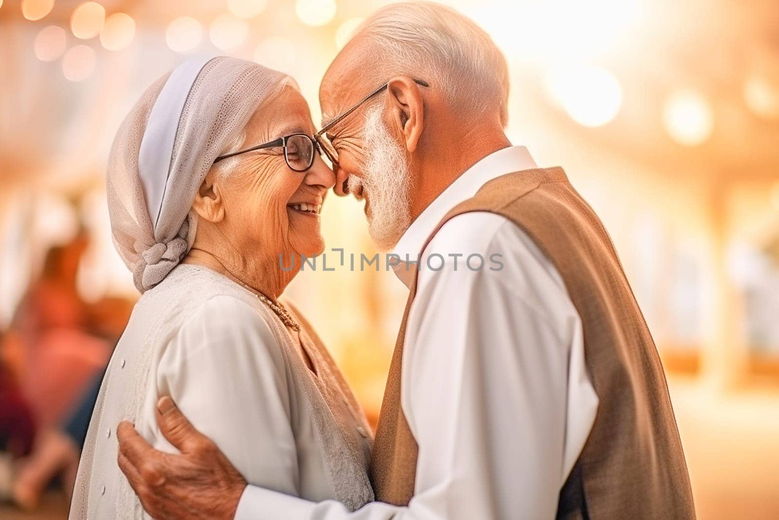 A happy couple of pensioners look at each other. High quality photo