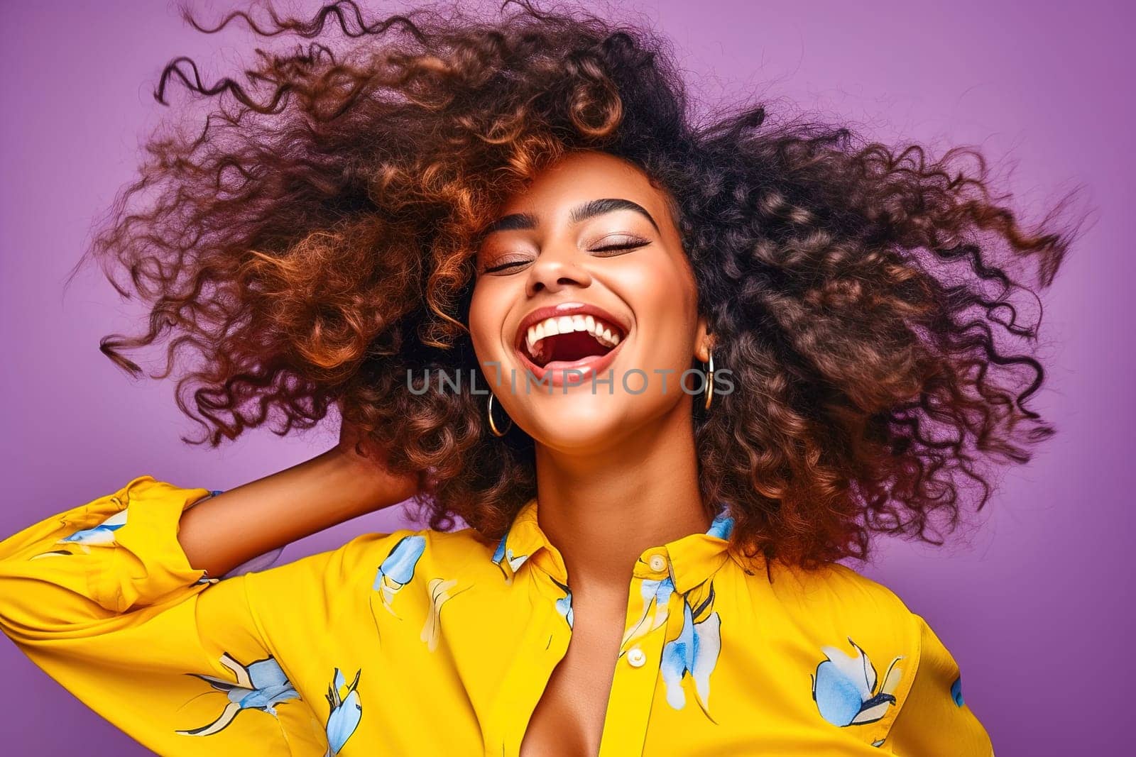 Laughing African-American woman in the studio. High quality photo