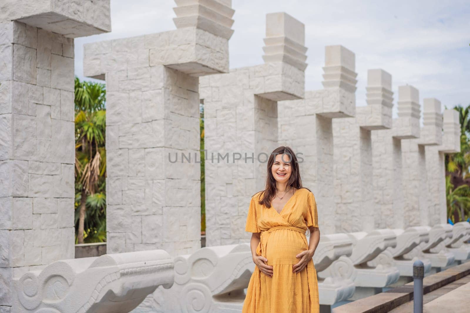 A strong and resilient woman over 40 embraces the beauty of childbirth in Mexico, celebrating the journey of motherhood with cultural richness.