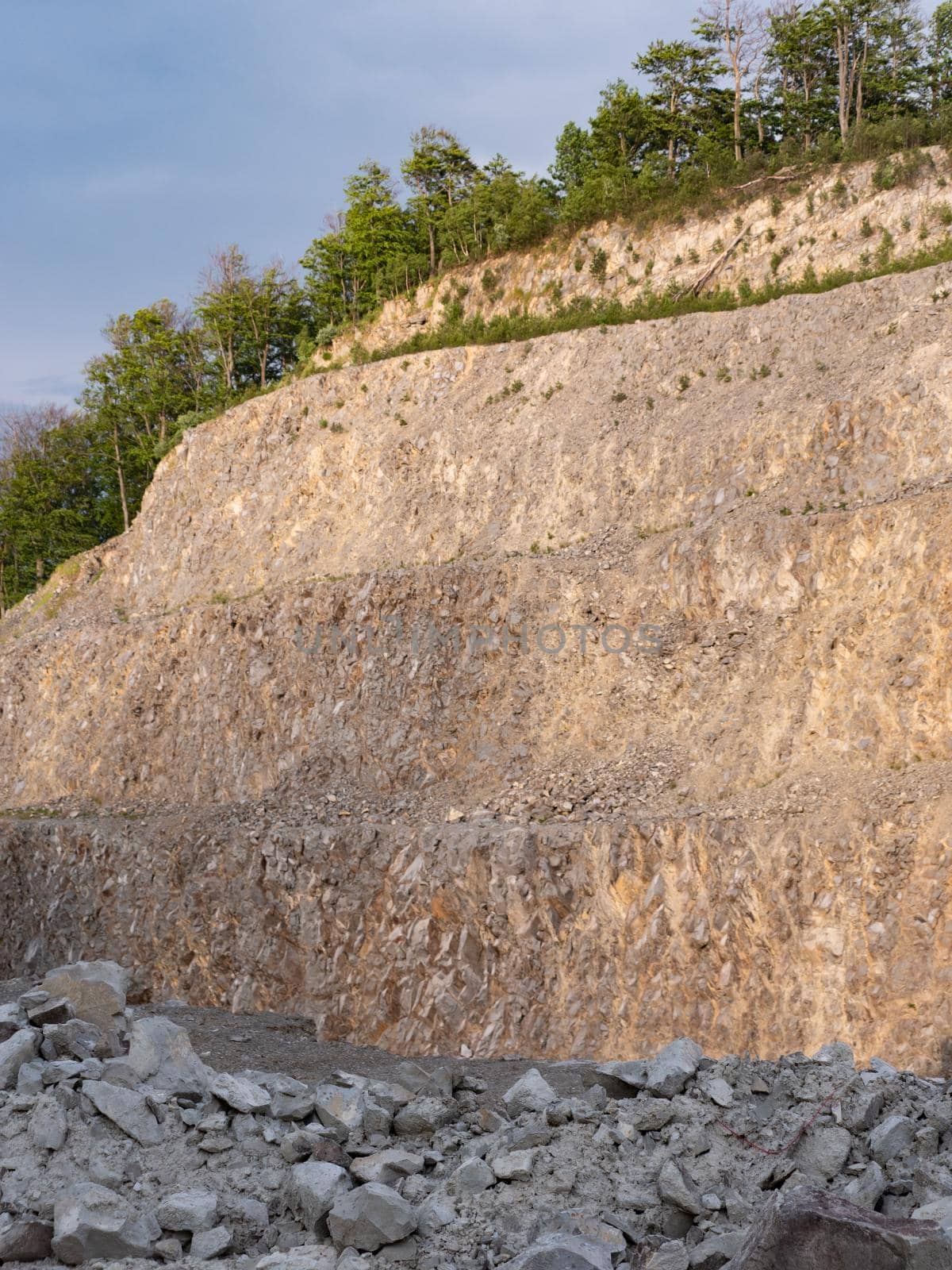 Detail of a stone pit in stone quarry. Industrial site, granite gravel  by rdonar2
