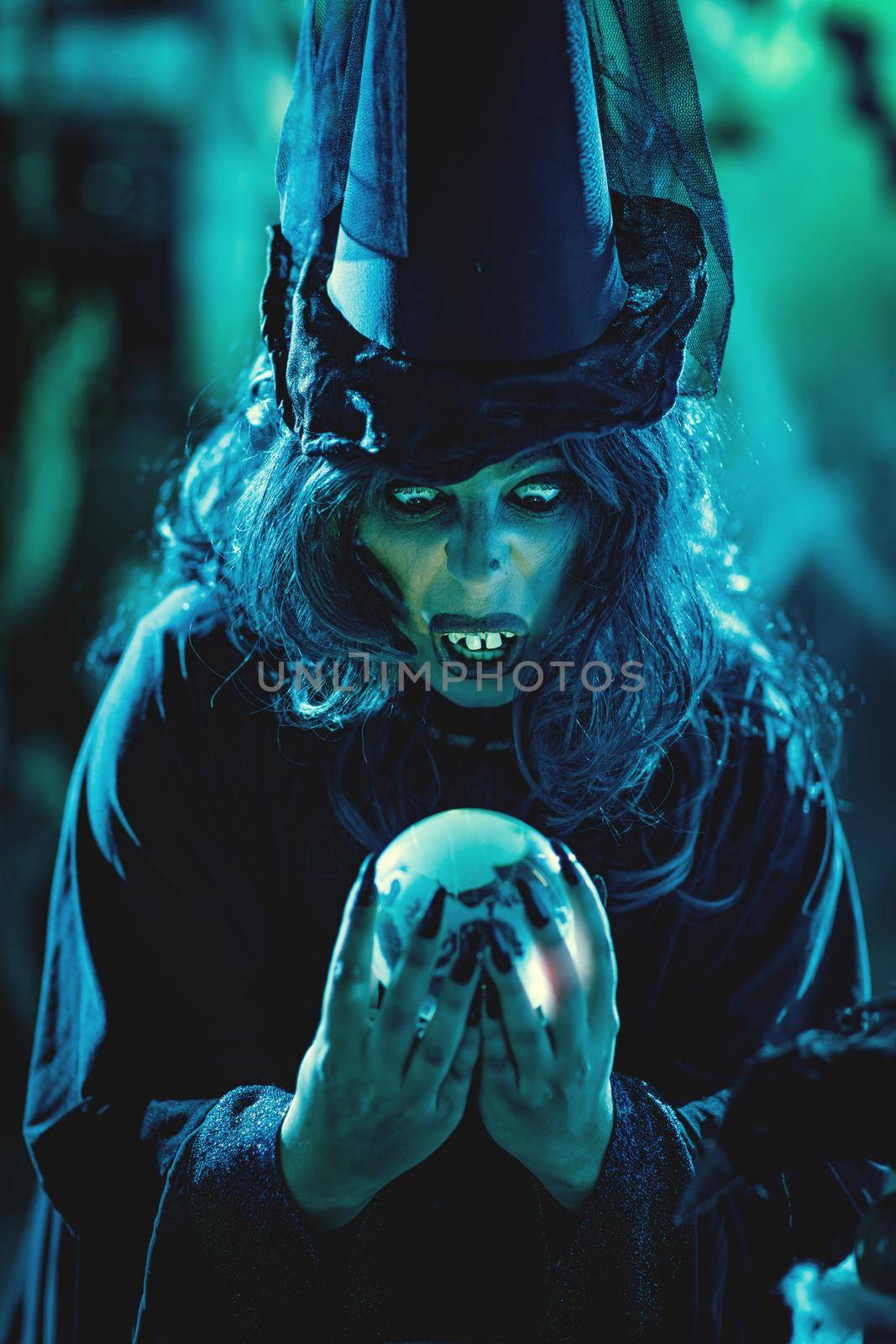 Magic Ball In Witch's Hands by MilanMarkovic78
