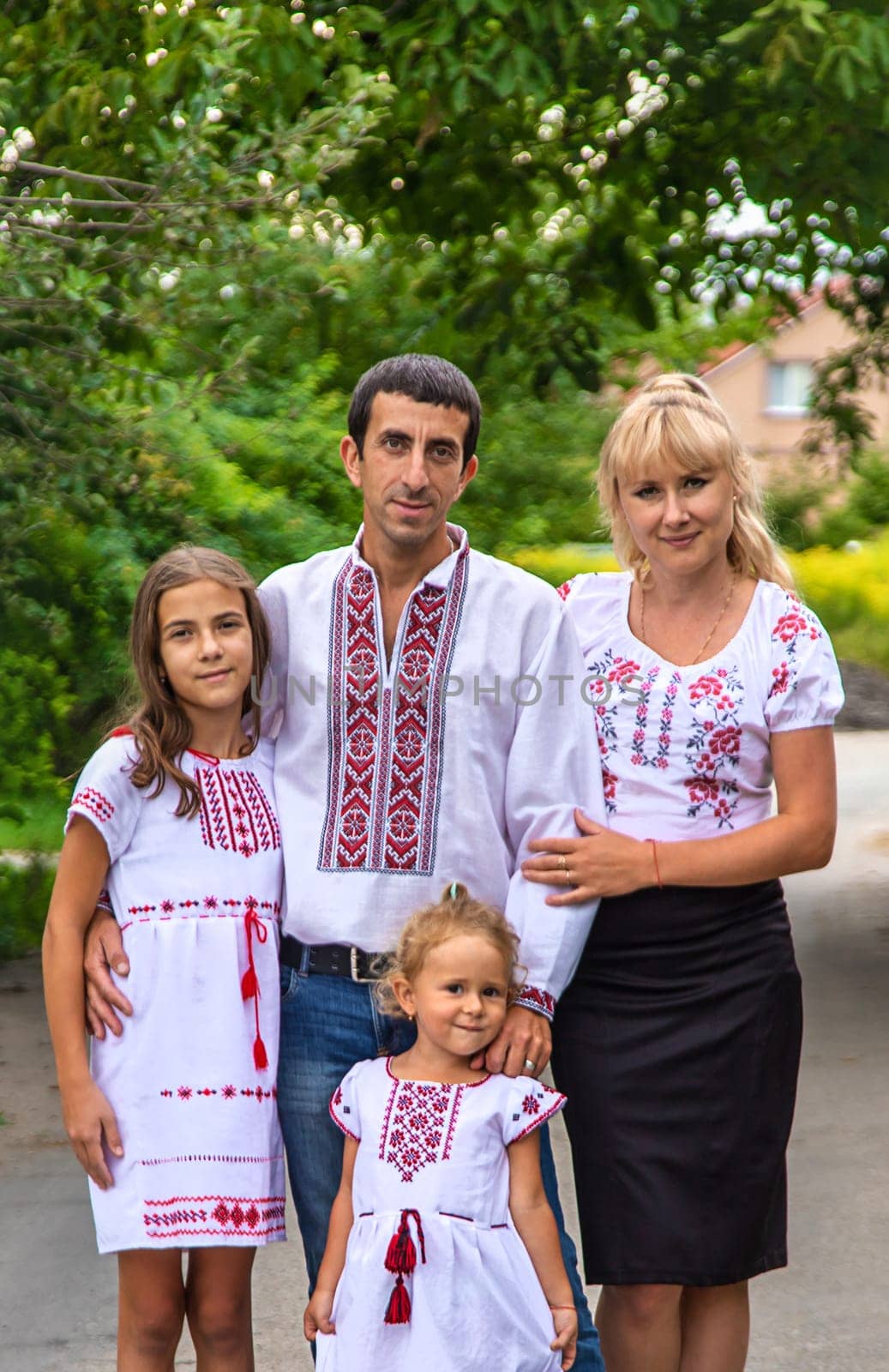 Family Ukrainians in vyshyvanka patriots. Selective focus. by yanadjana