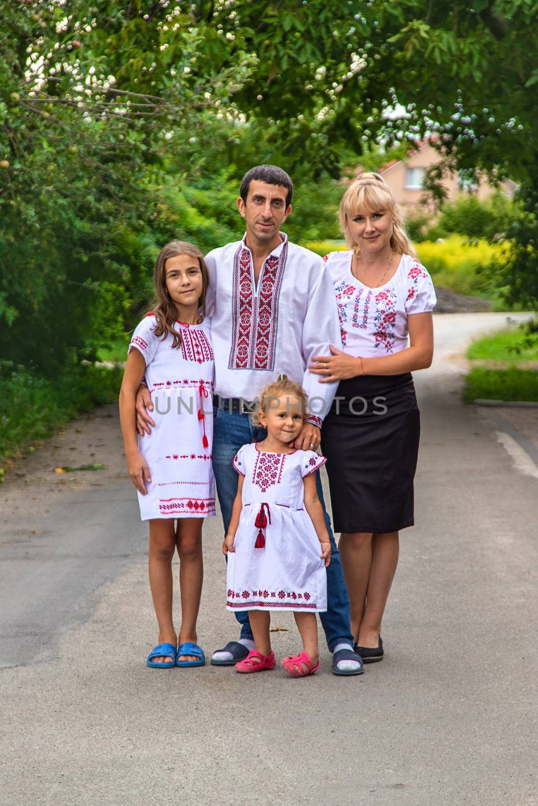 Family Ukrainians in vyshyvanka patriots. Selective focus. by yanadjana