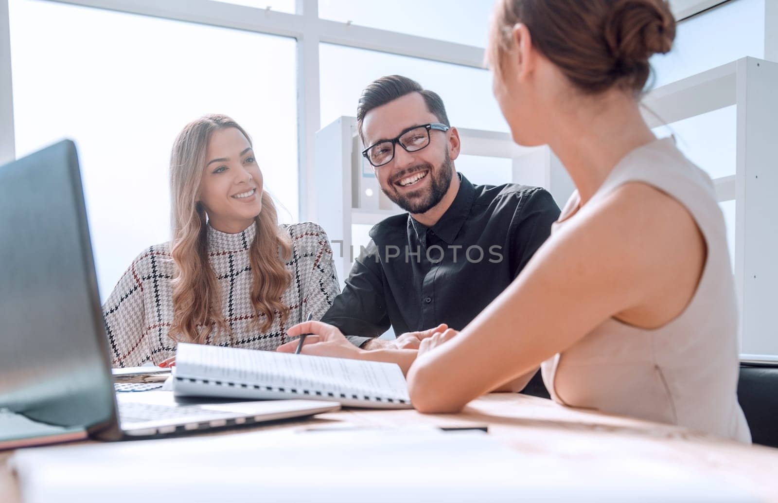 young business woman explaining her ideas at a business meeting. the concept of teamwork