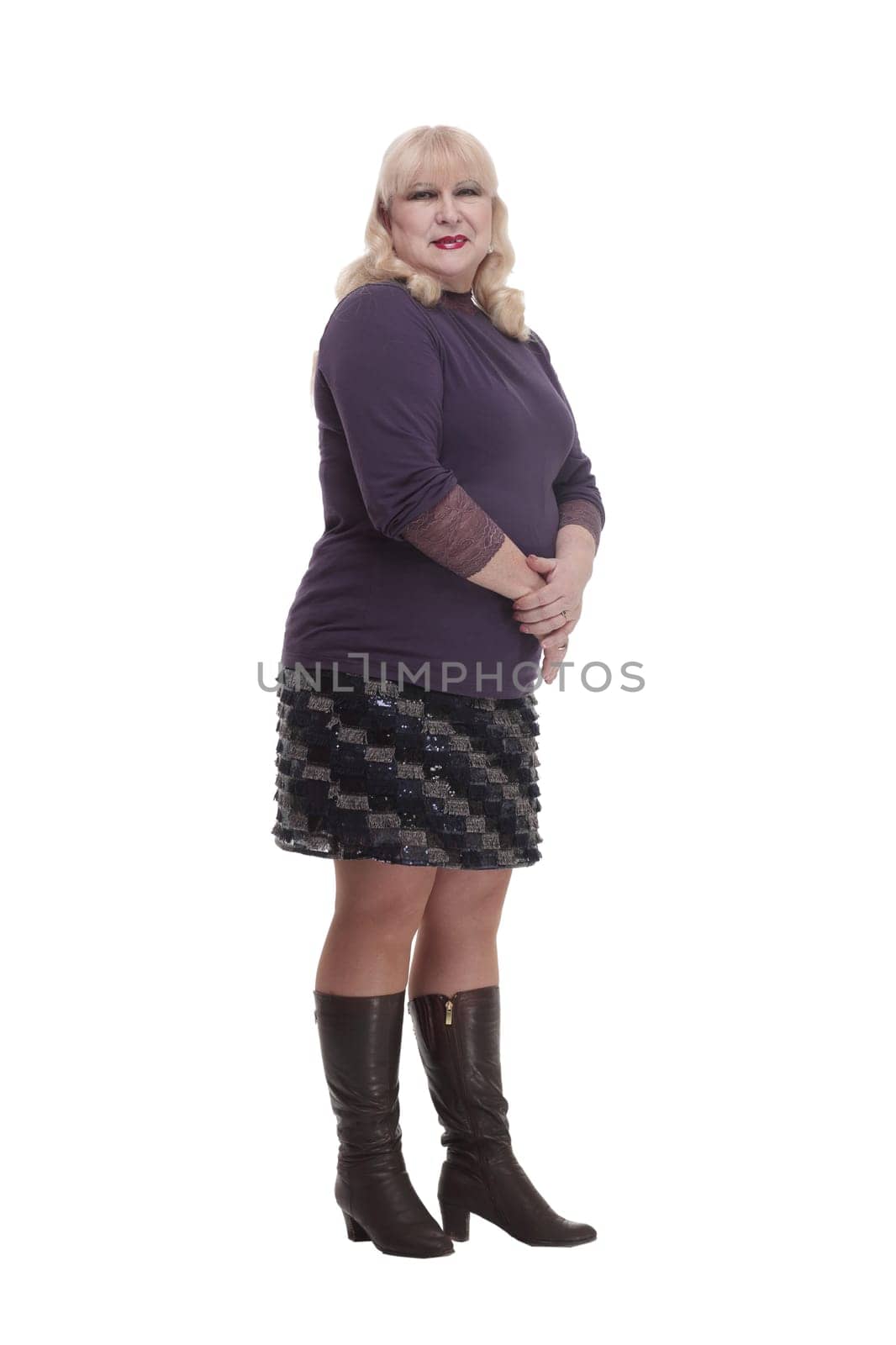 in full growth. casual mature woman in comfortable clothes . isolated on a white background.
