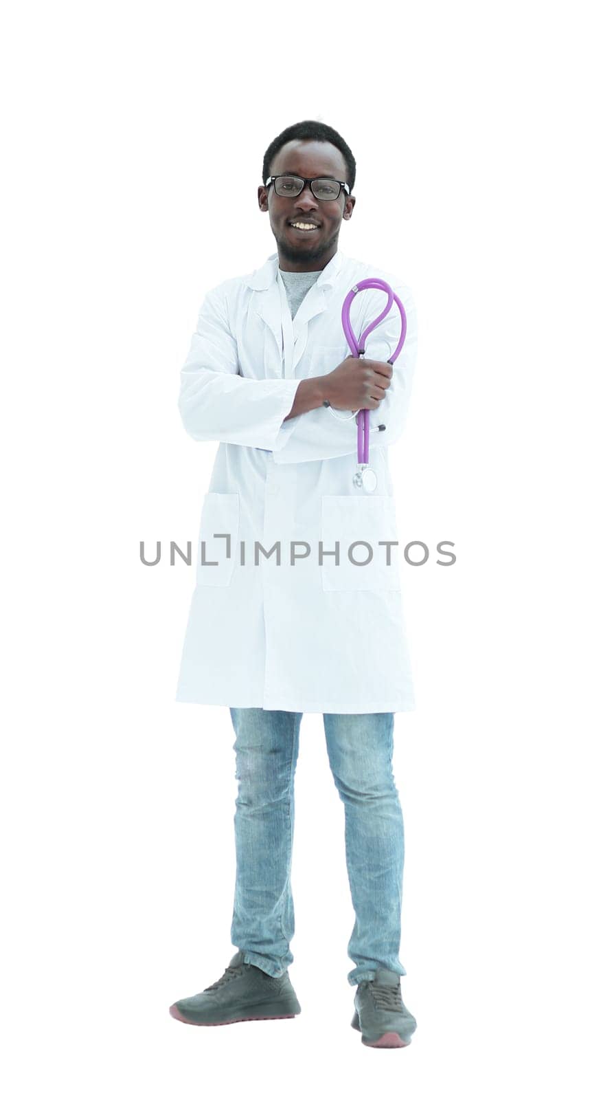in full growth. smiling doctor looking at the camera. isolated on white