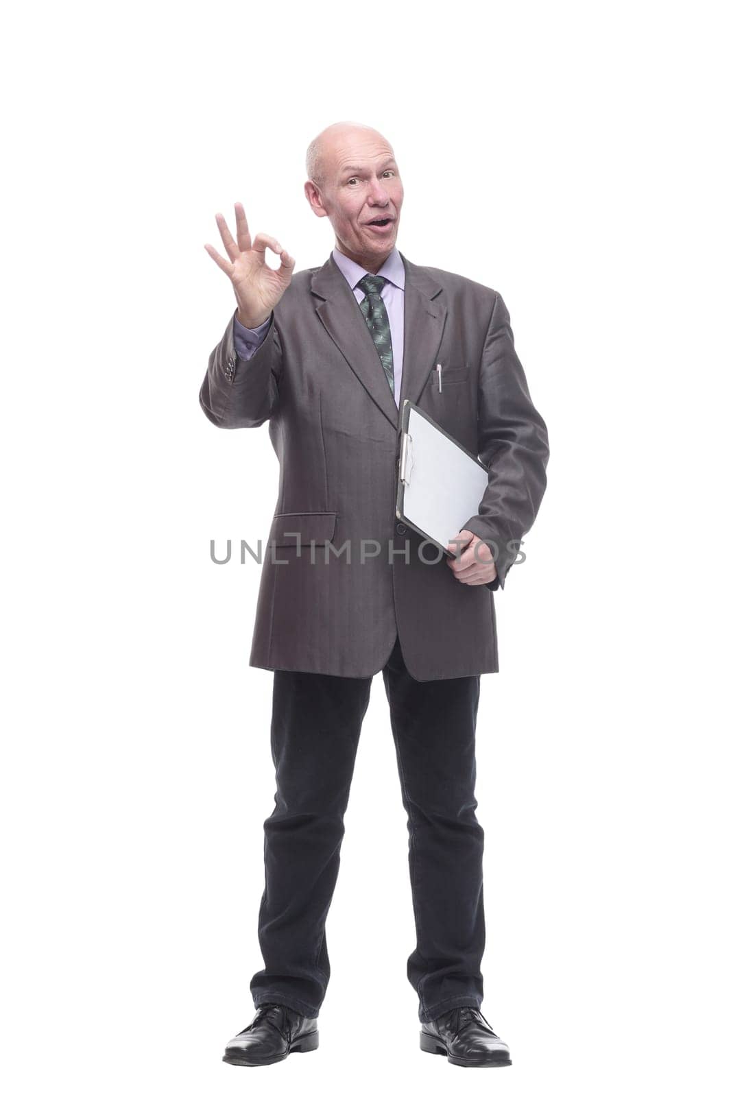 in full growth.Executive business man with clipboard. isolated on a white background.