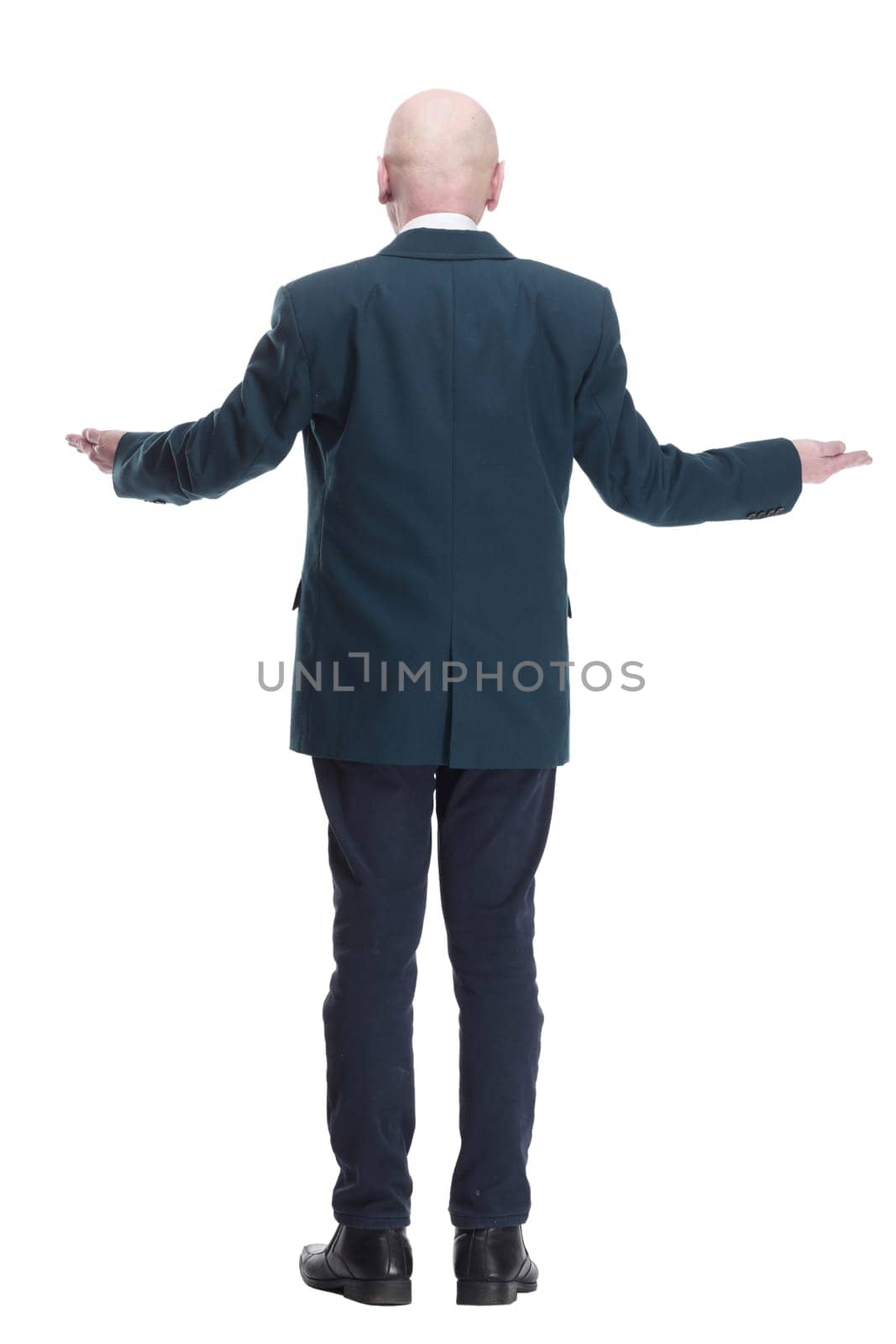 back view. business man reading an ad on a white screen. isolated on a white background.