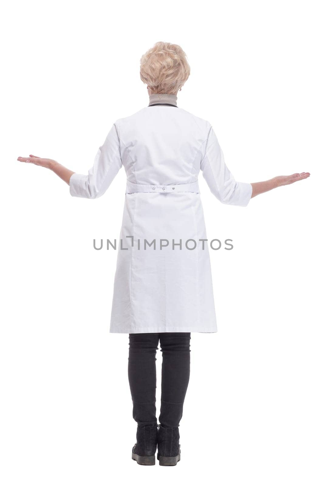 in full growth. responsible female doctor with a stethoscope. isolated on a white background.