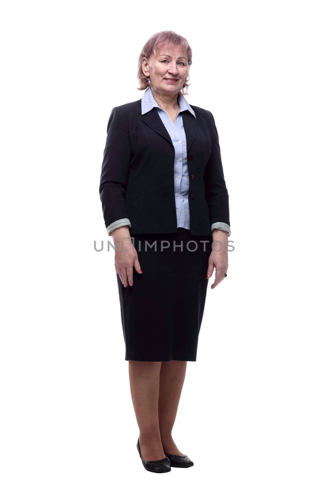 in full growth. portrait of a confident elderly businesswoman . isolated on a white background