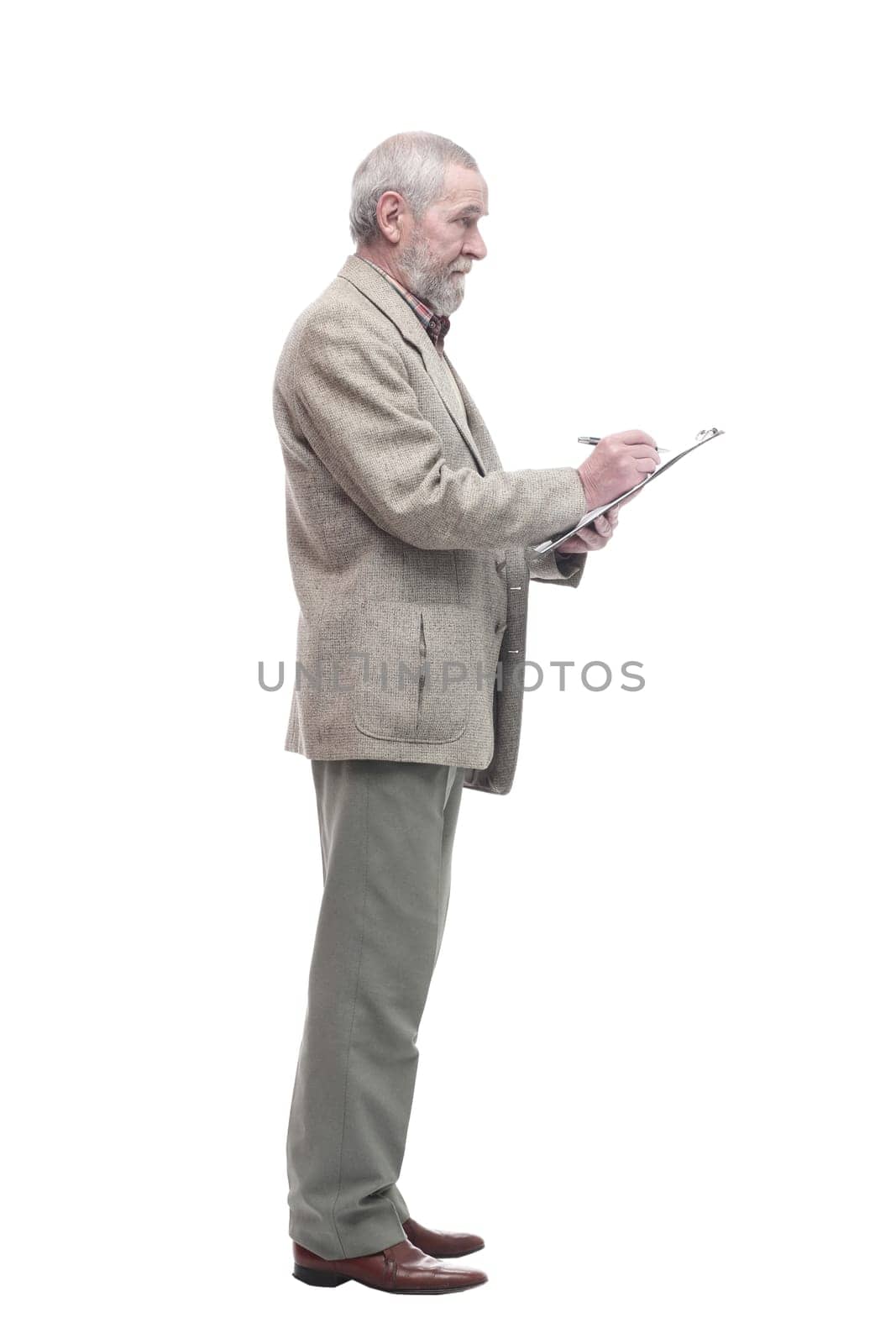 in full growth. elderly business man with a clipboard. isolated on a white background.