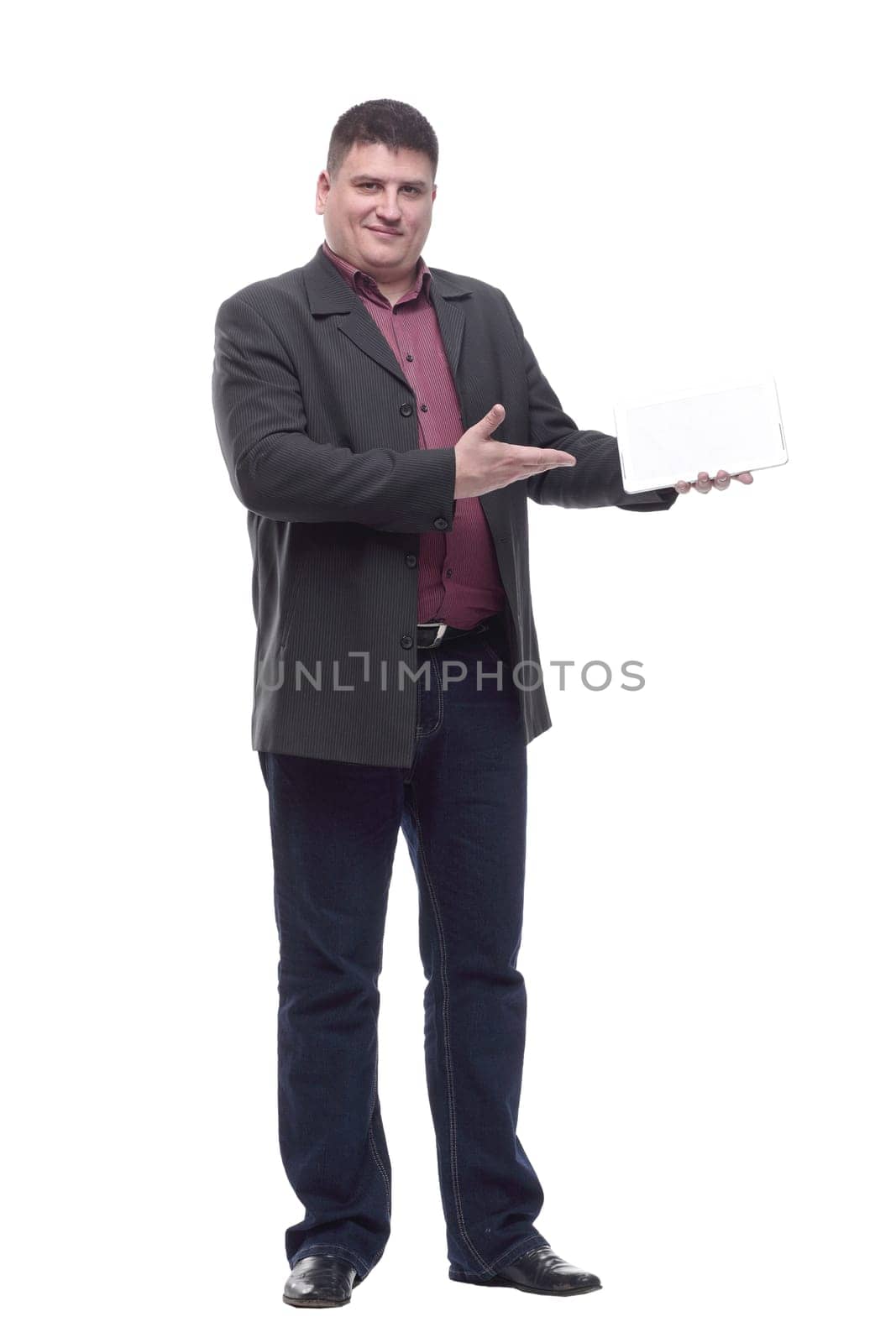 side view. Mature business man with a digital tablet. isolated on a white background.