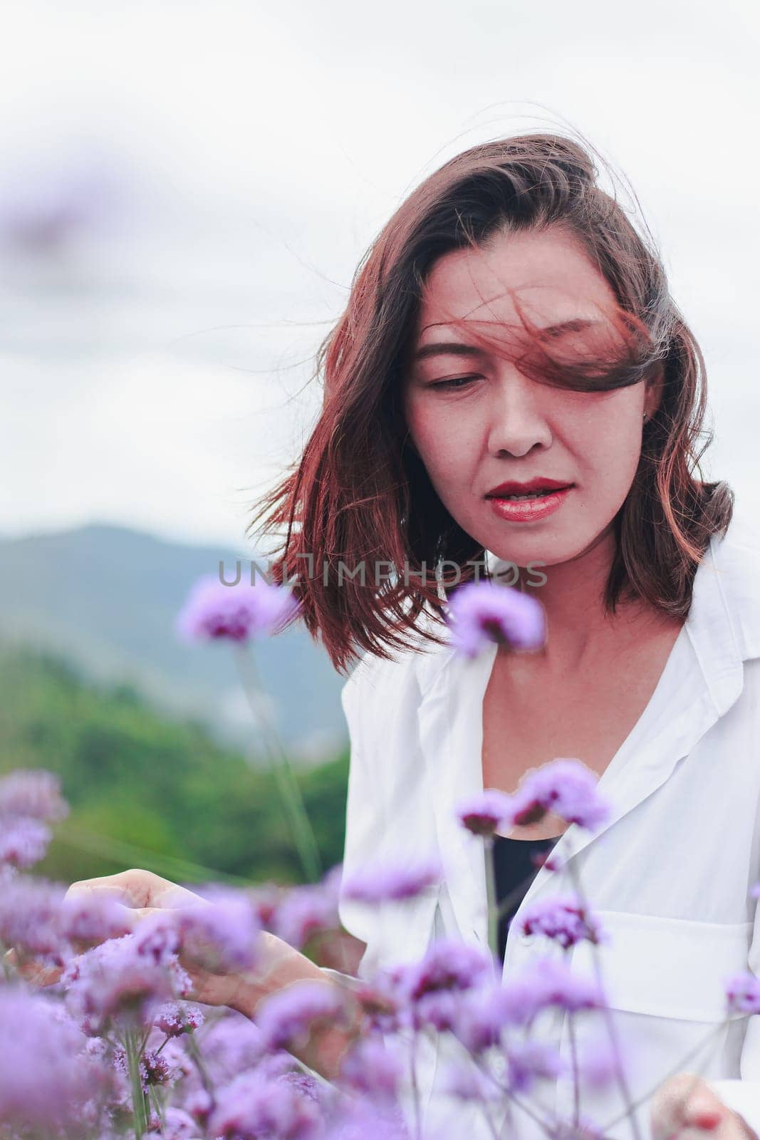 Women  are blooming and beautiful in the rainy season. by Puripatt
