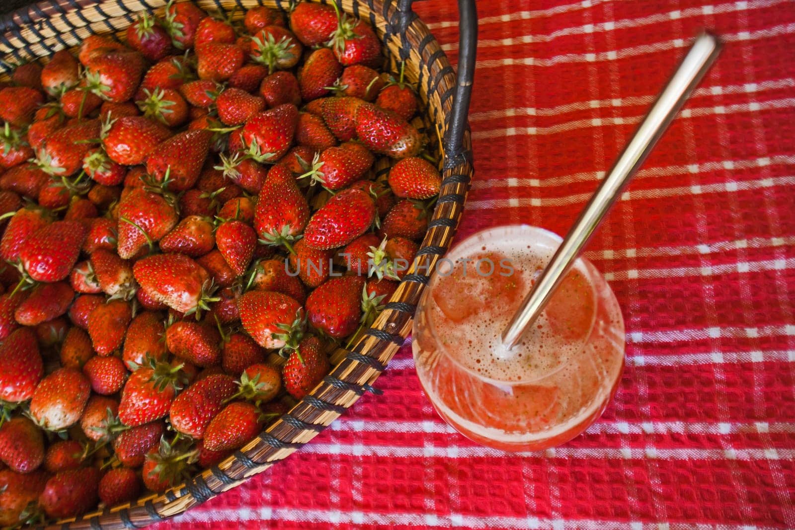 Freshly picked strawberries and strawberry cocktail