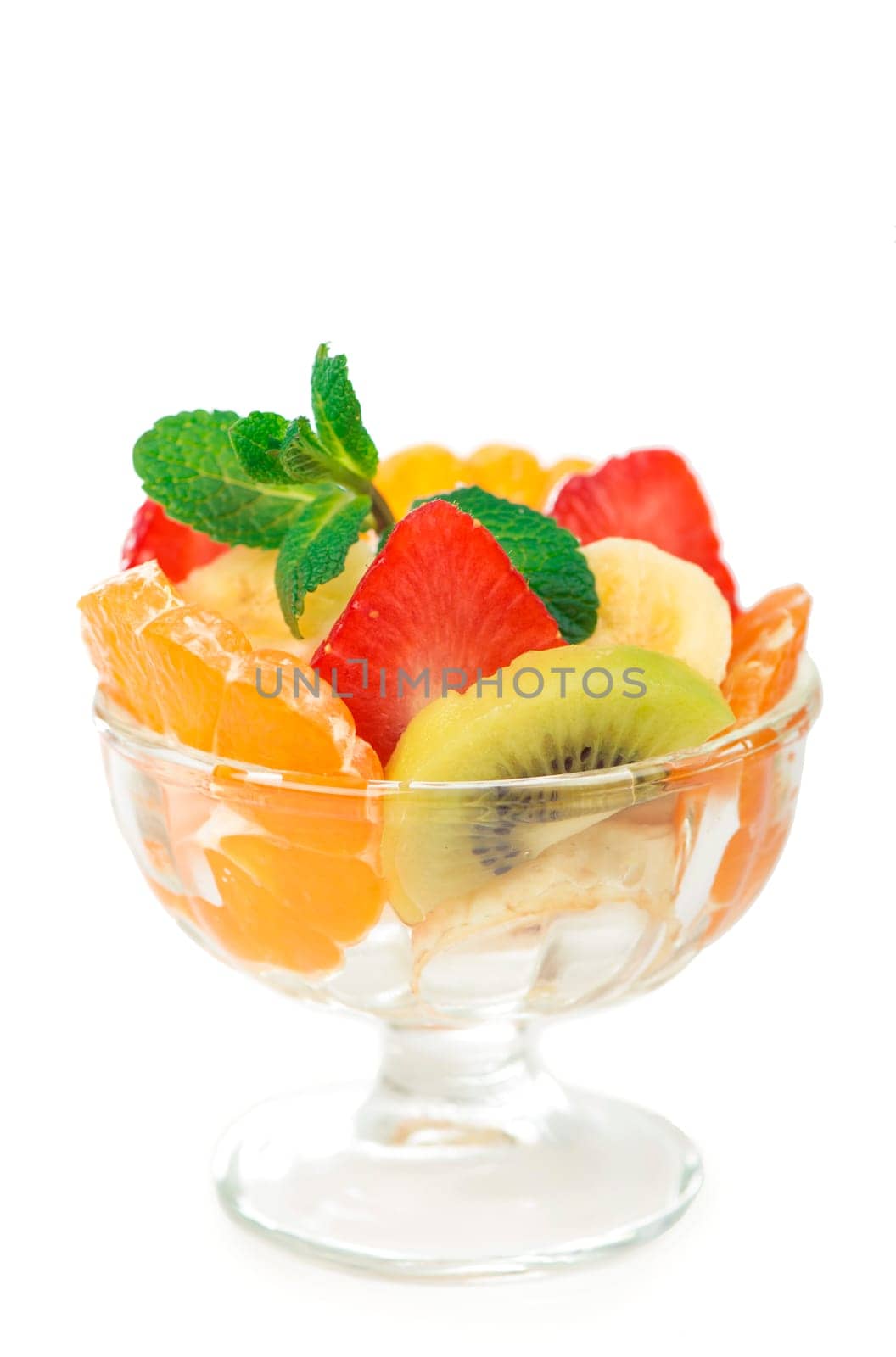 glass bowl with fresh fruits salad by aprilphoto