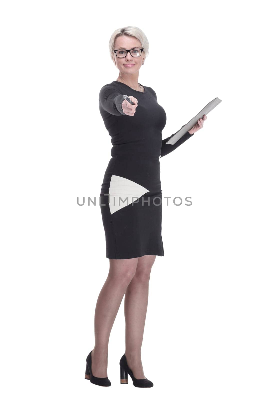 in full growth. confident business woman with clipboard pointing at you. isolated on white background.