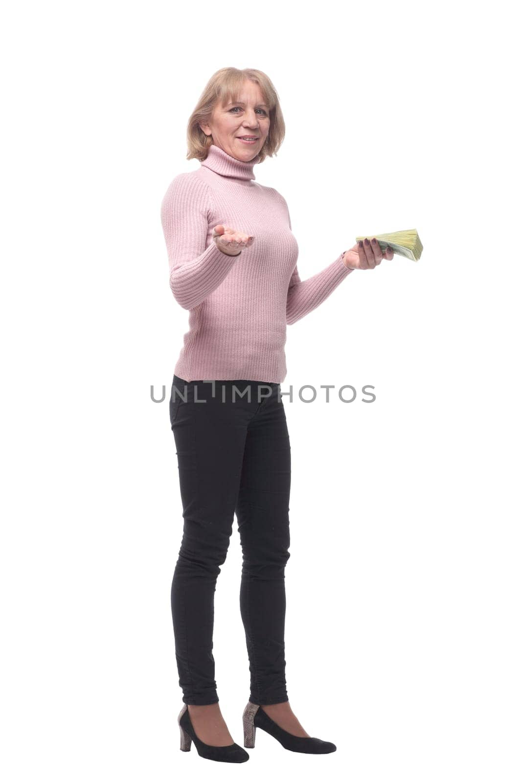 Young happy woman with dollars in hand. Isolated on white background