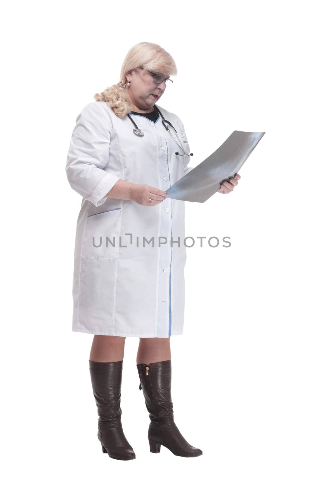 in full growth. female doctor with an x-ray . isolated on a white background.