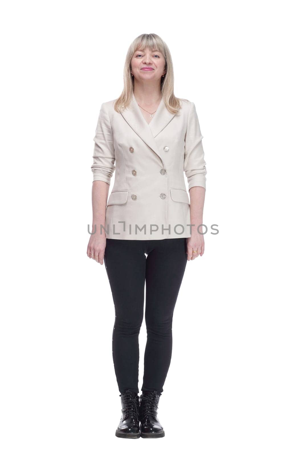 full-length. casual woman in a white jacket and black leggings. isolated on a white background.