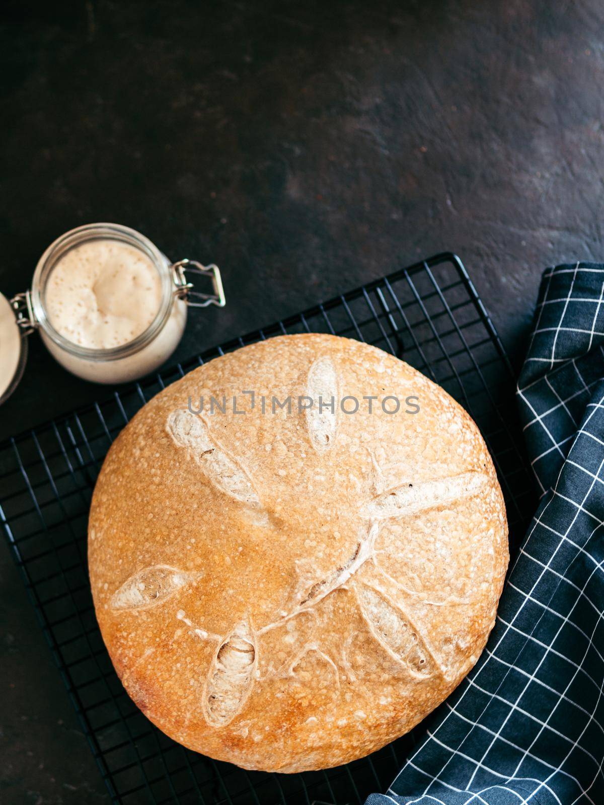 Wheat round sourdough bread, copy space, top view by fascinadora