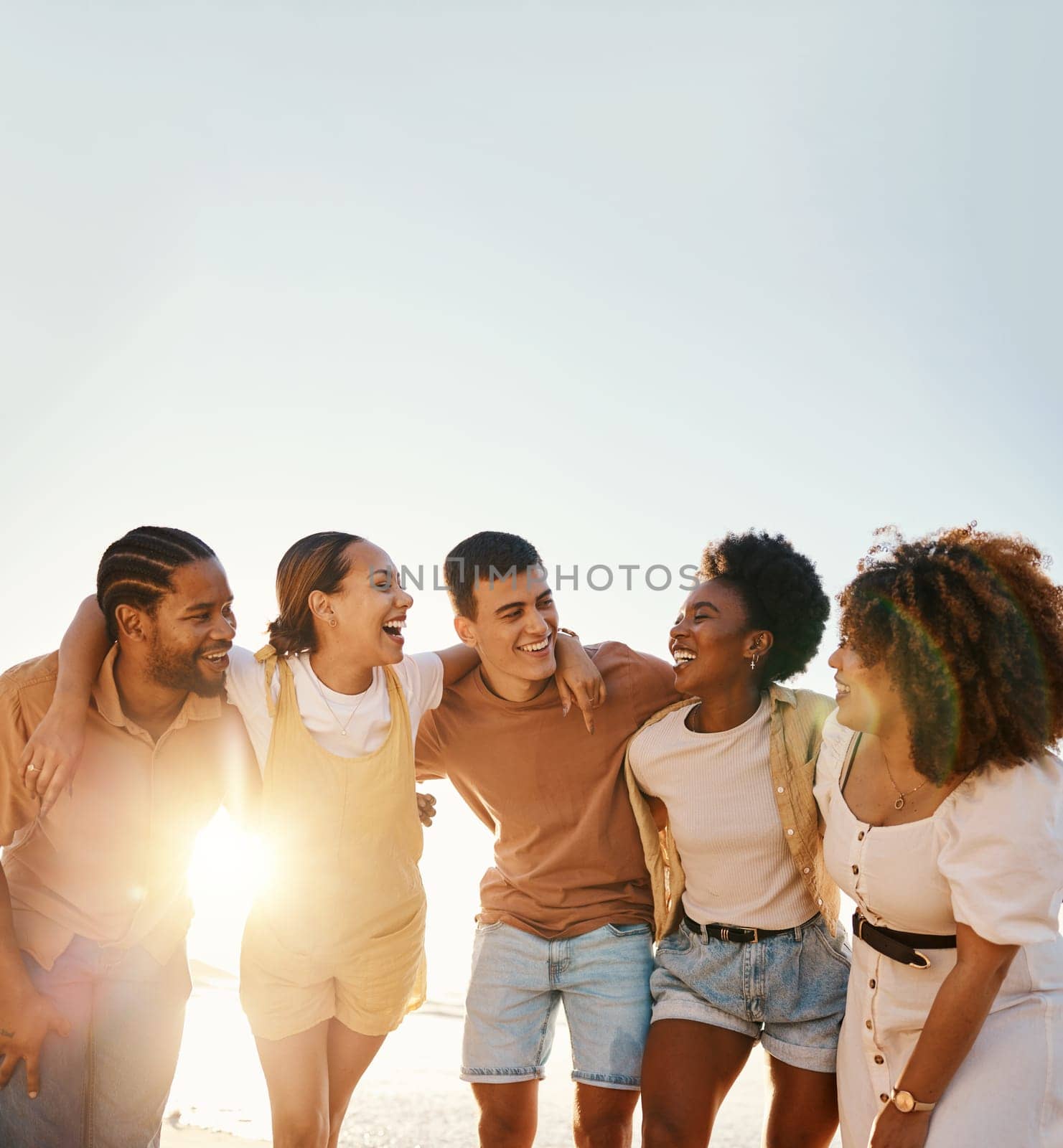 Friends, summer and people happy at sunset beach for fun, banner space and travel with a smile. Diversity, men and women group in nature with a laugh, love and happiness on a vacation or holiday by YuriArcurs
