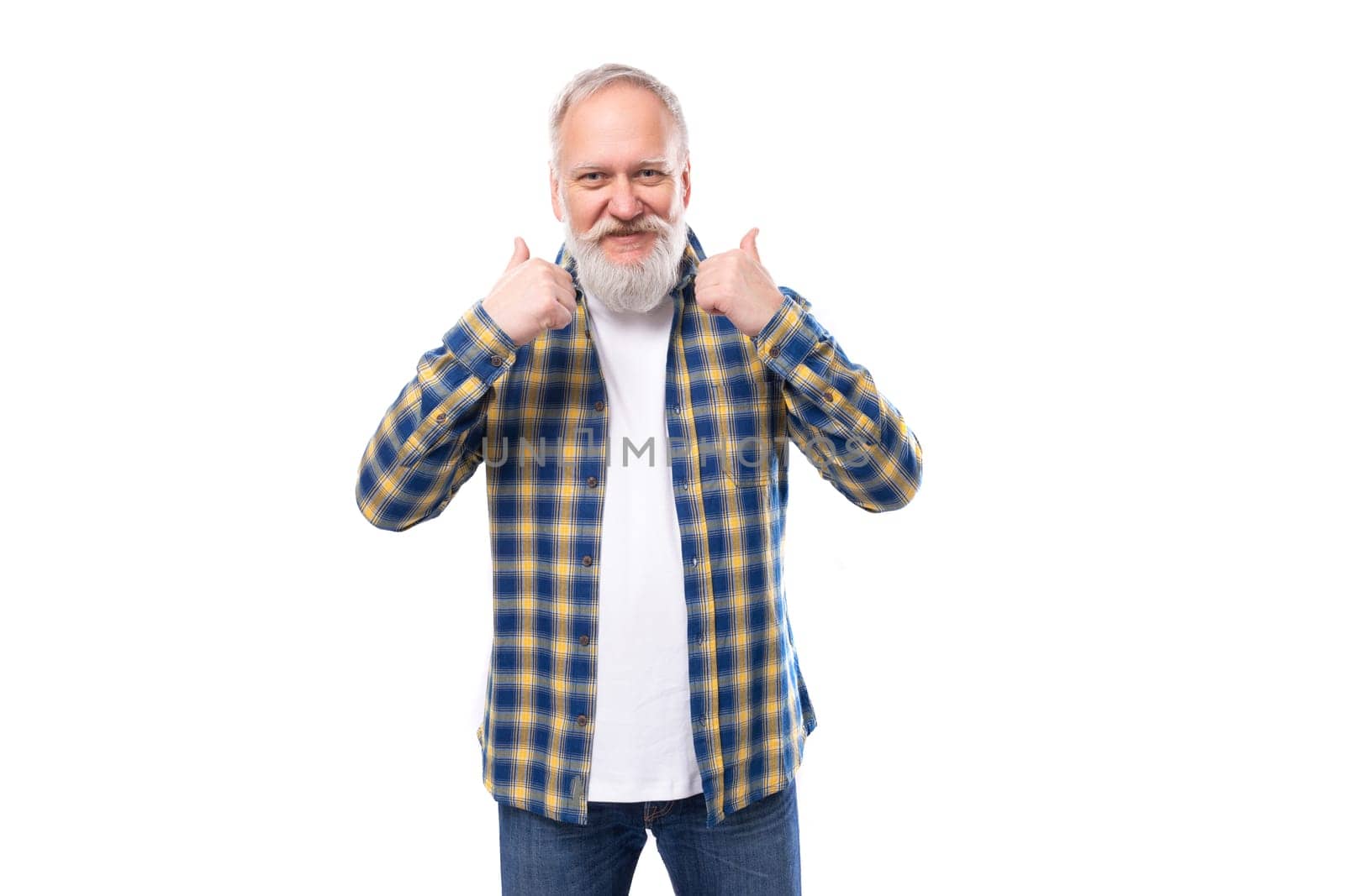 nice well-groomed mature gray-haired man with a beard in a shirt on a white background with copy space.